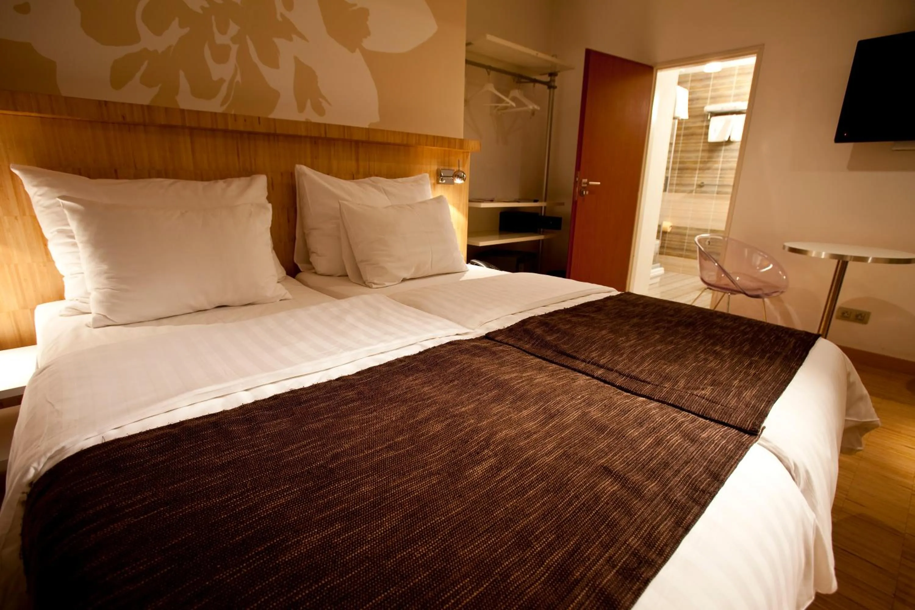 Bed in Dahlia Inn