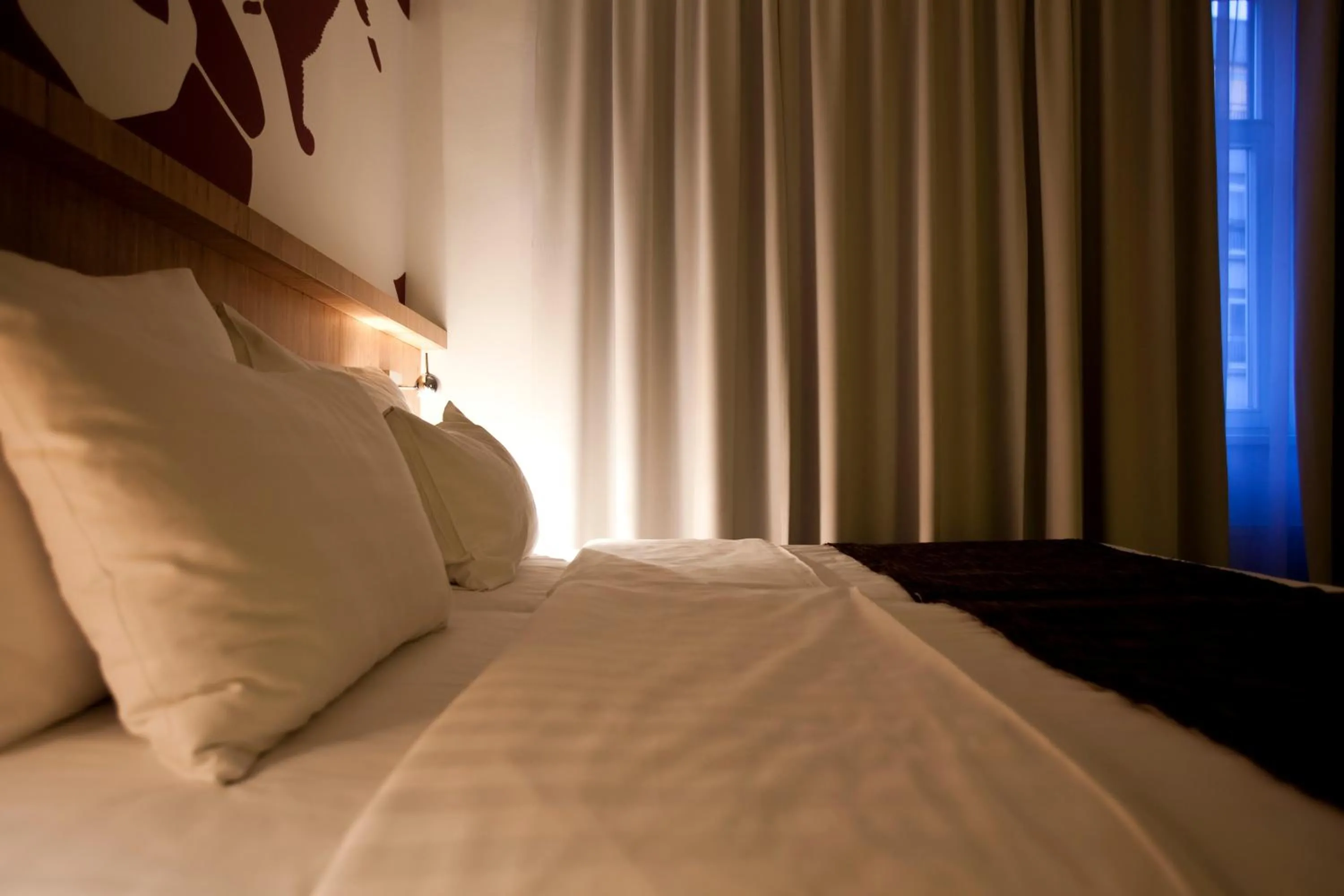 Bed in Dahlia Inn