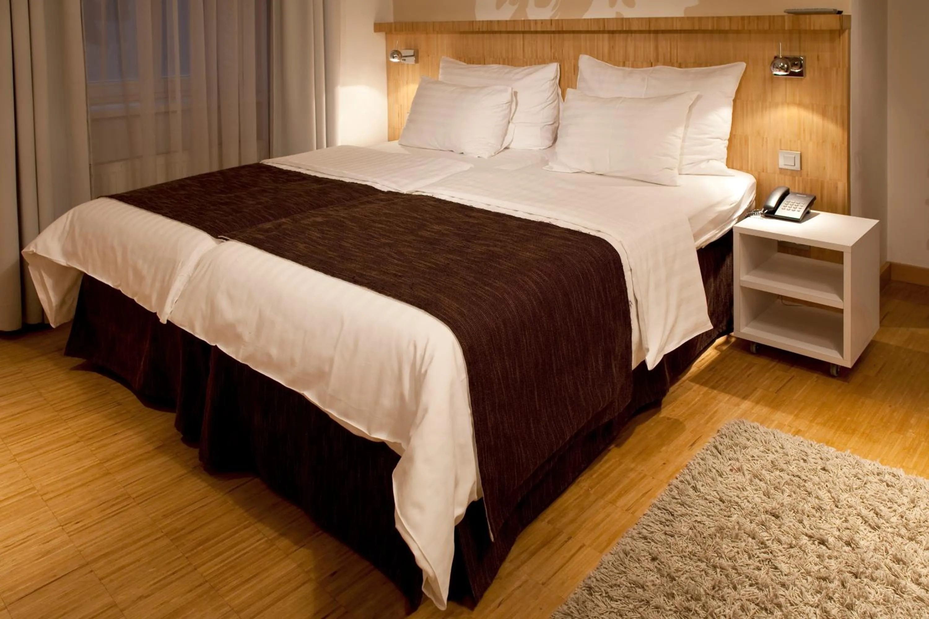 Bed in Dahlia Inn
