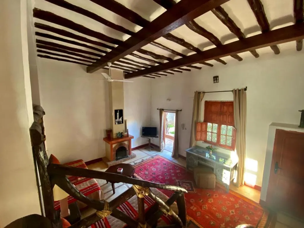 Living room, Bed in Relais Esmeralda
