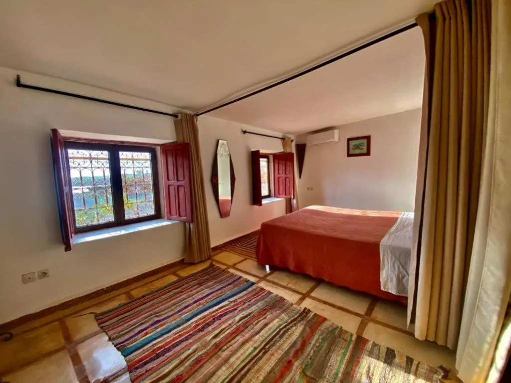 Bed in Relais Esmeralda