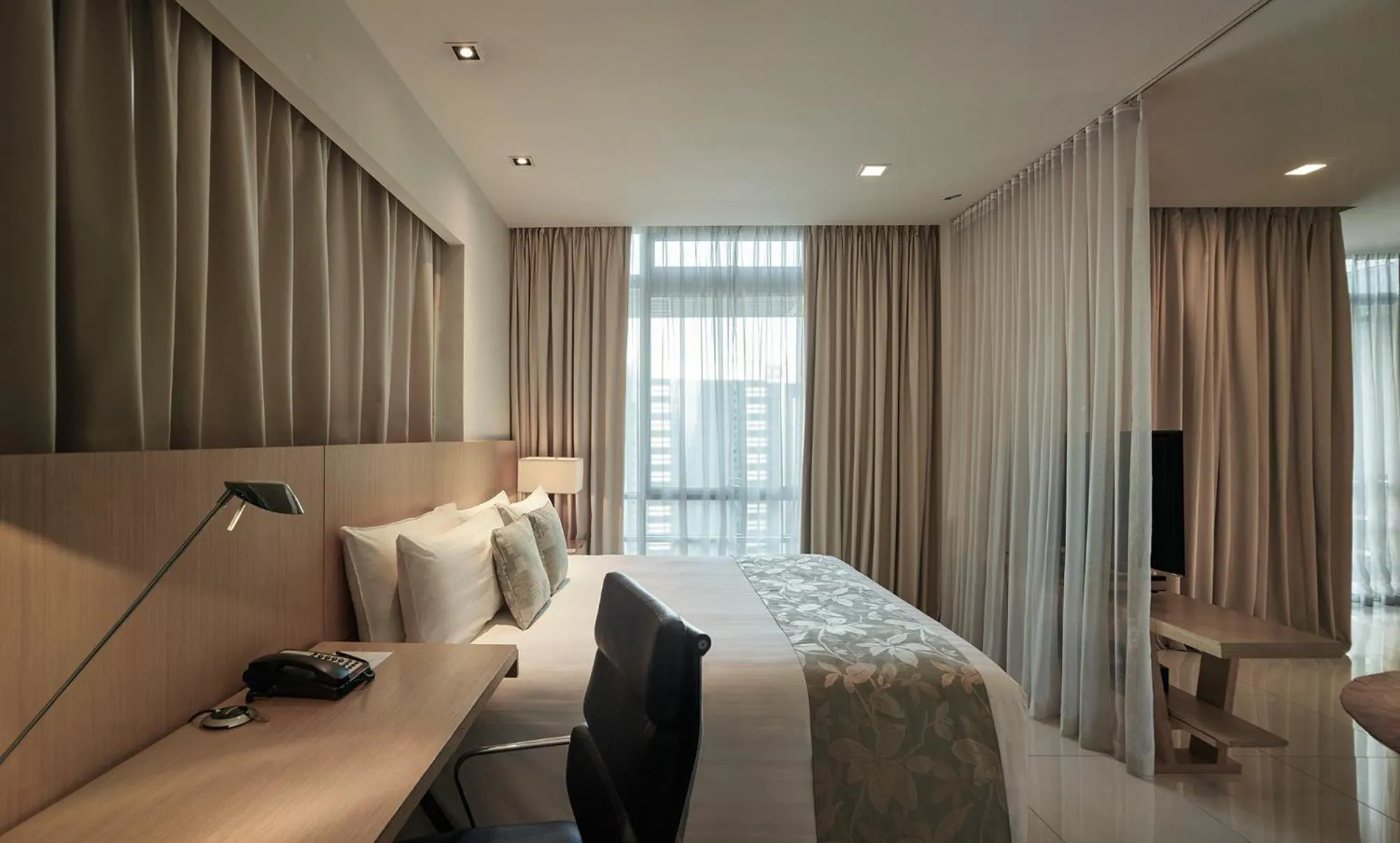 Bed in PARKROYAL Serviced Suites Kuala Lumpur