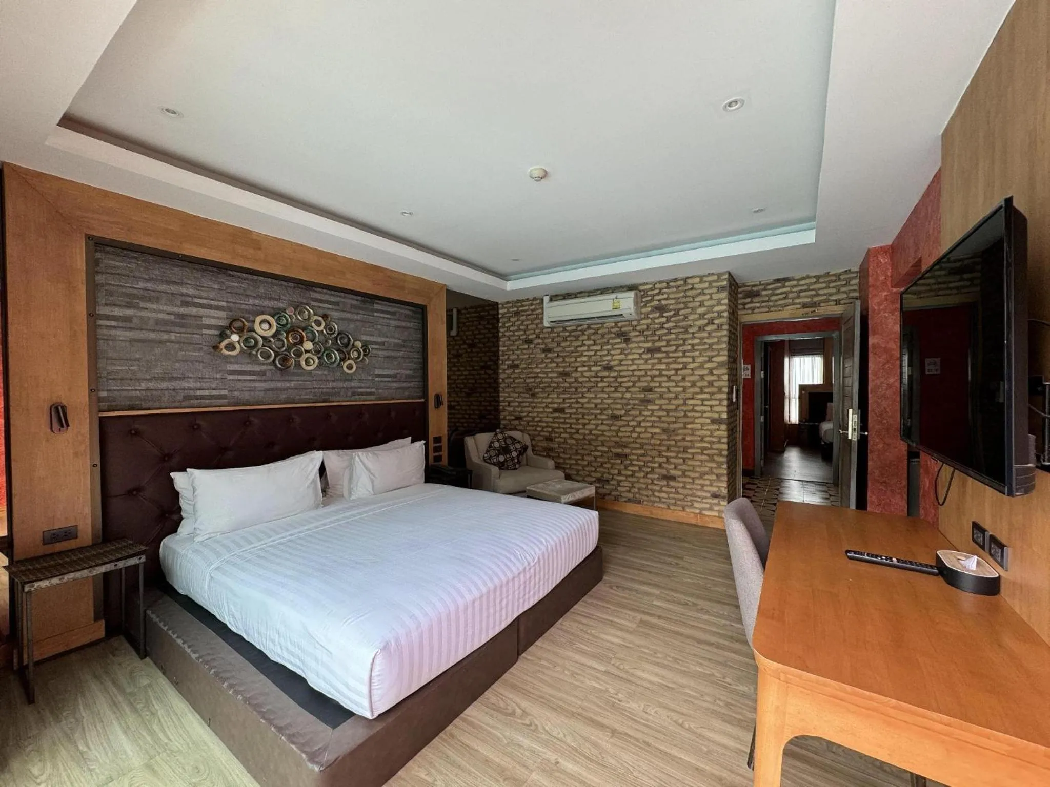Bed in La Isla Pranburi Beach Resort