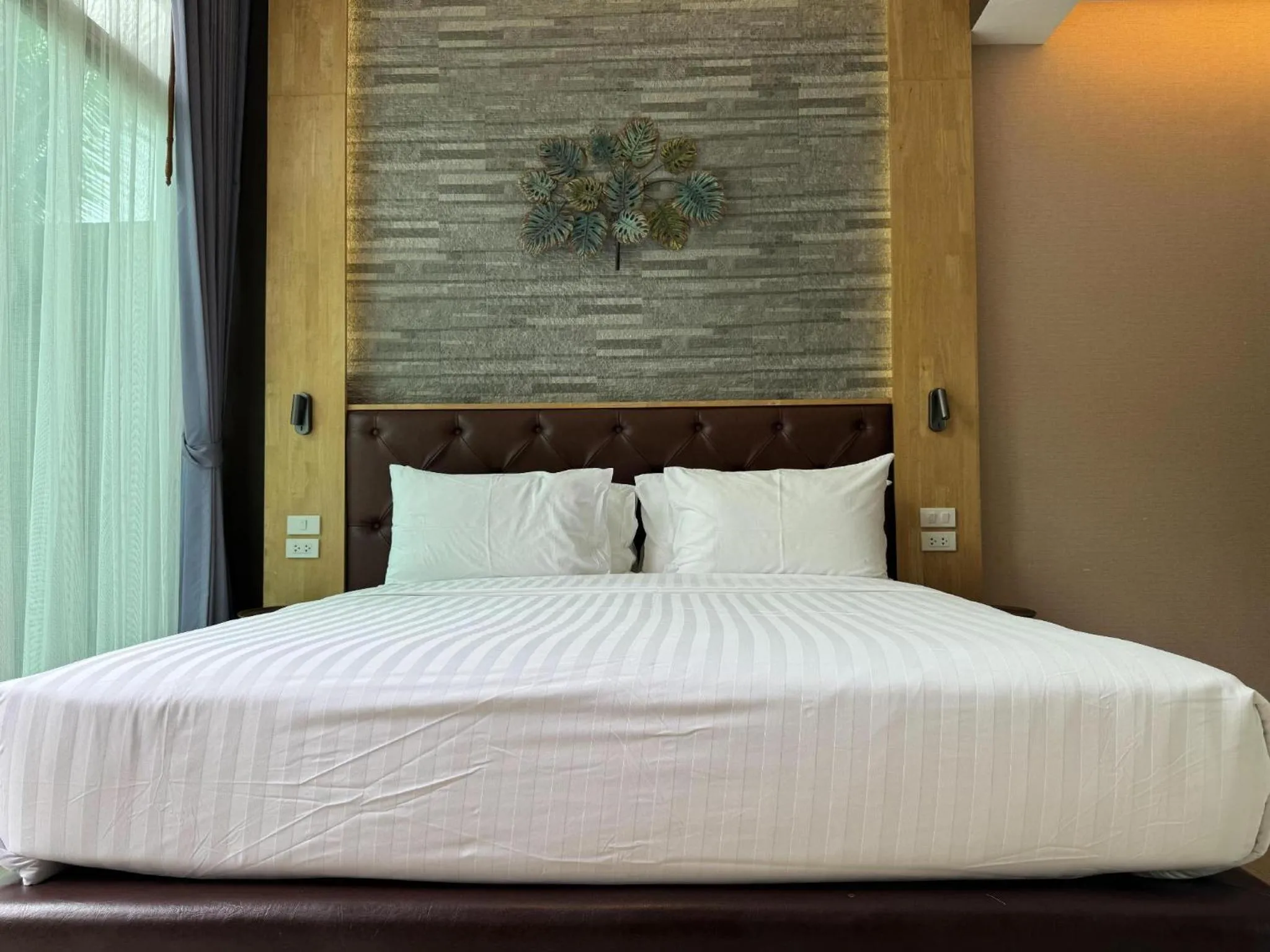 Bed in La Isla Pranburi Beach Resort