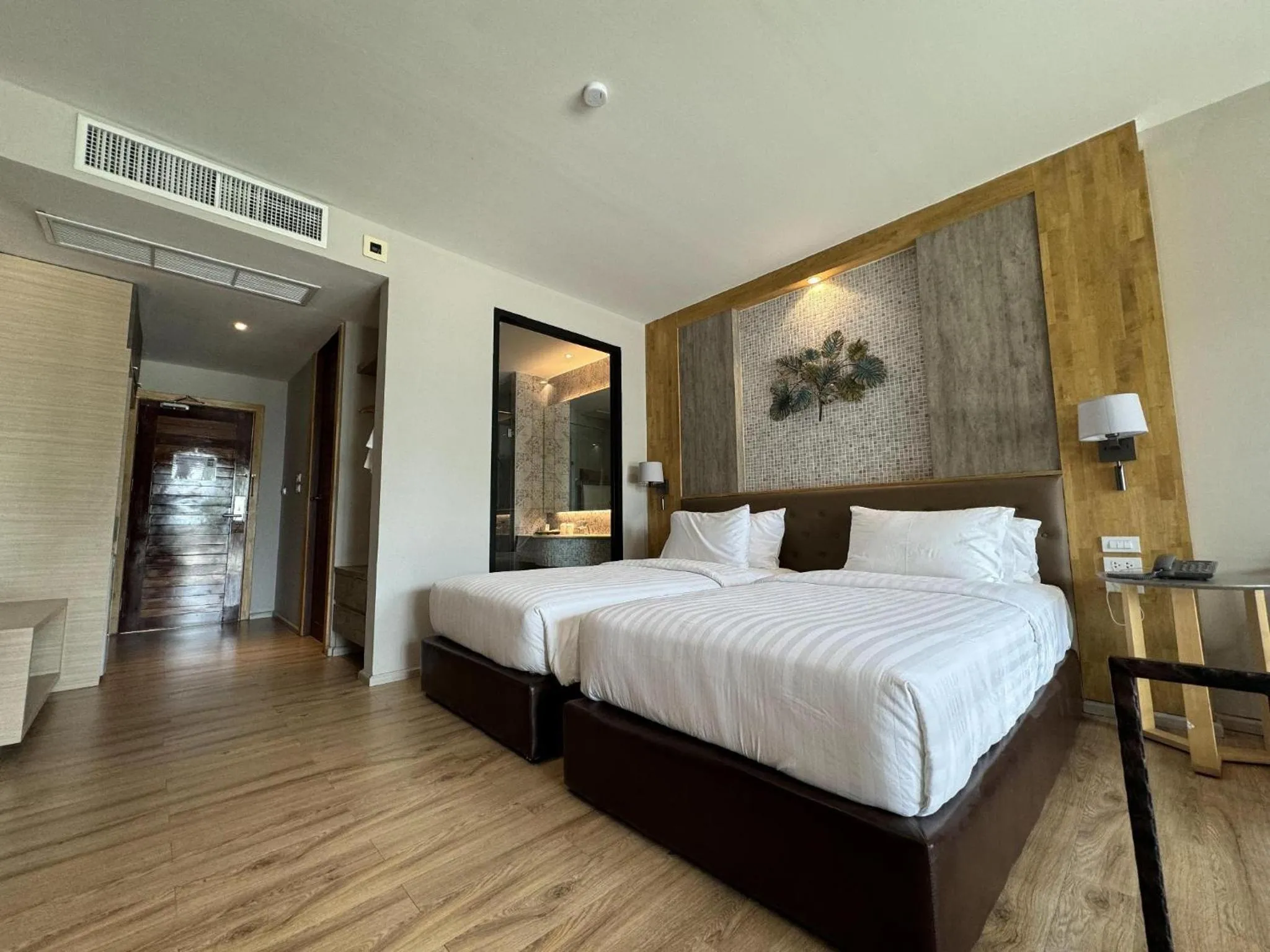 Bed in La Isla Pranburi Beach Resort