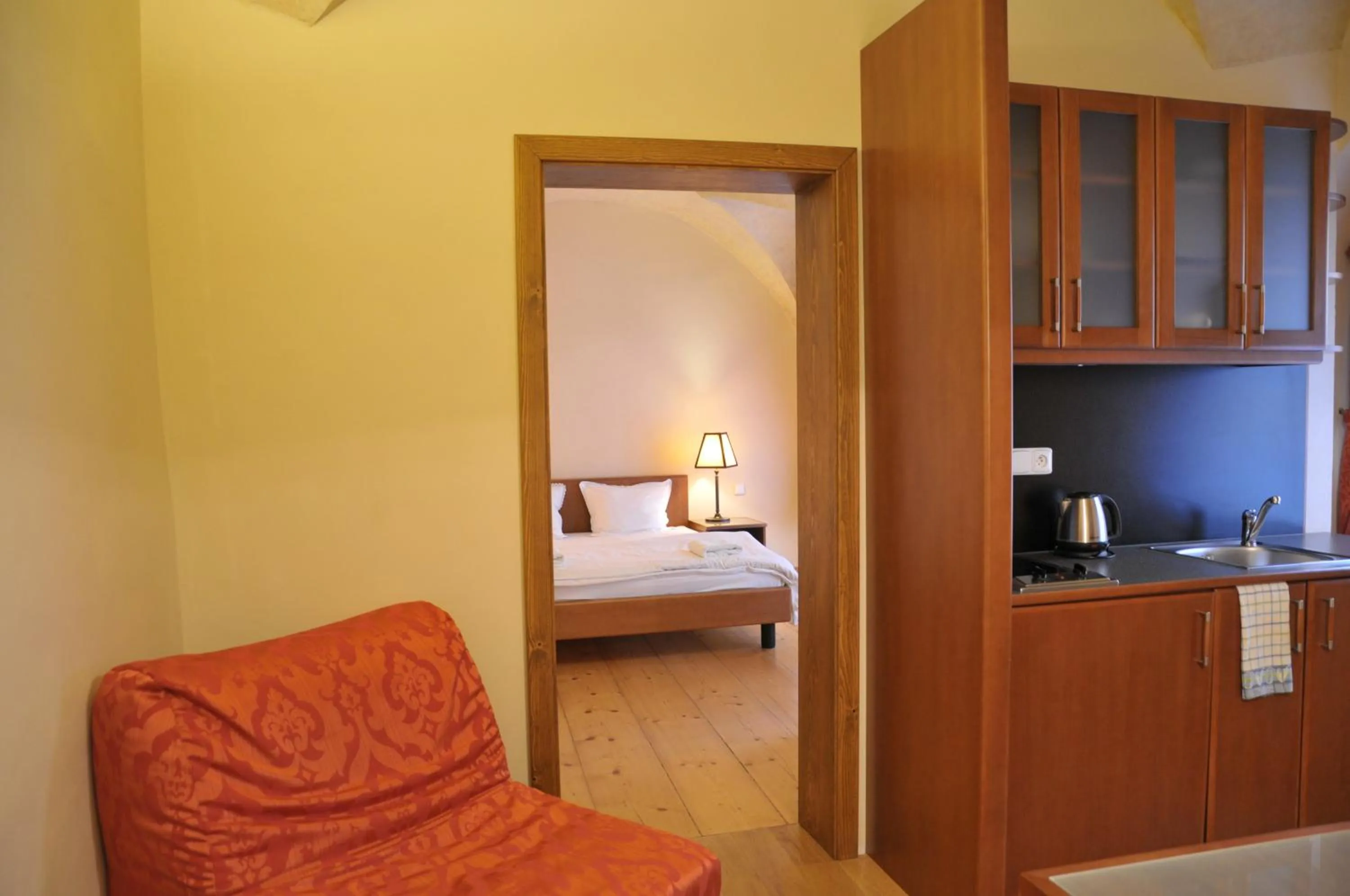 Kitchen or kitchenette, Bed in Residence Thunovska