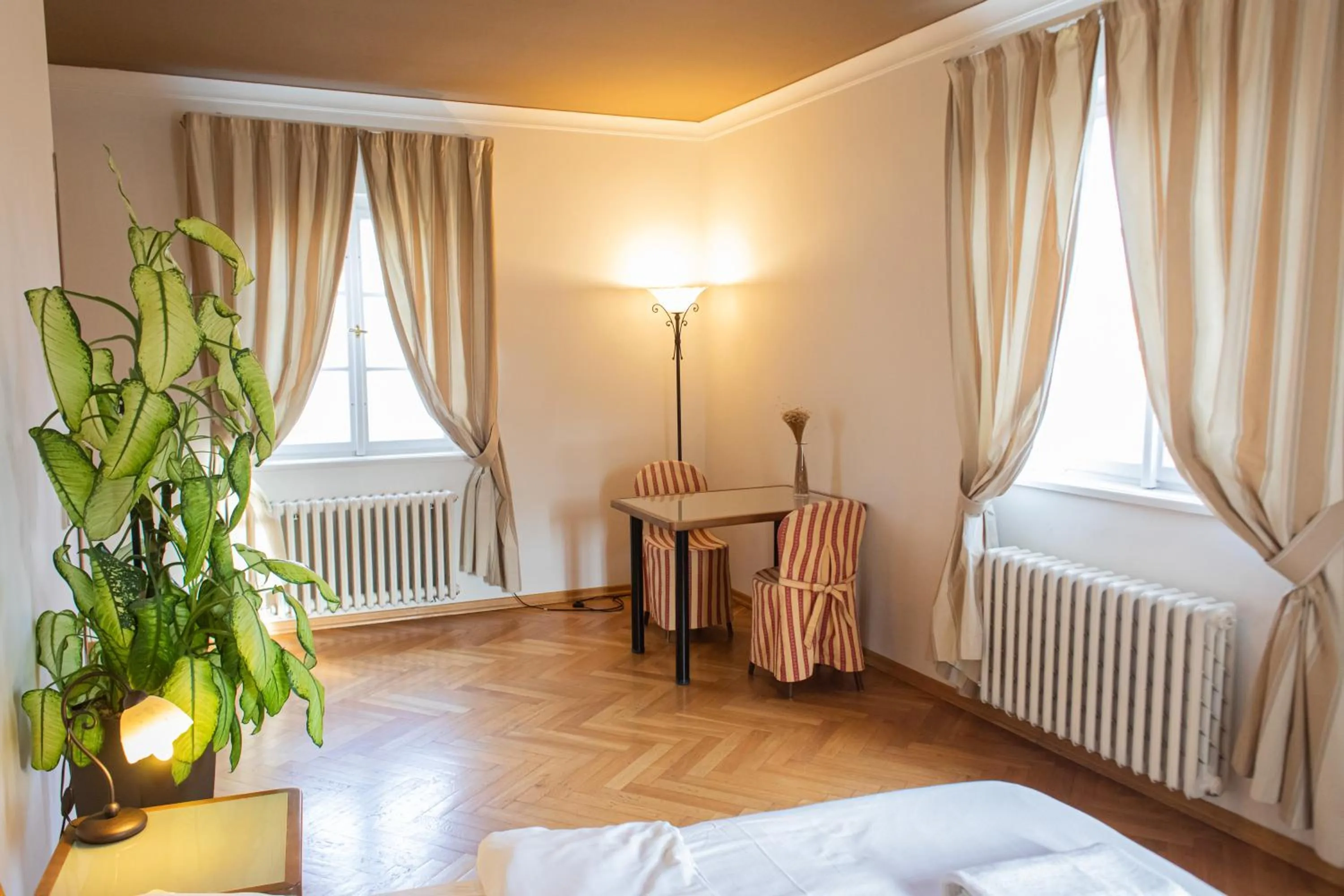 Seating area, Bed in Residence Thunovska