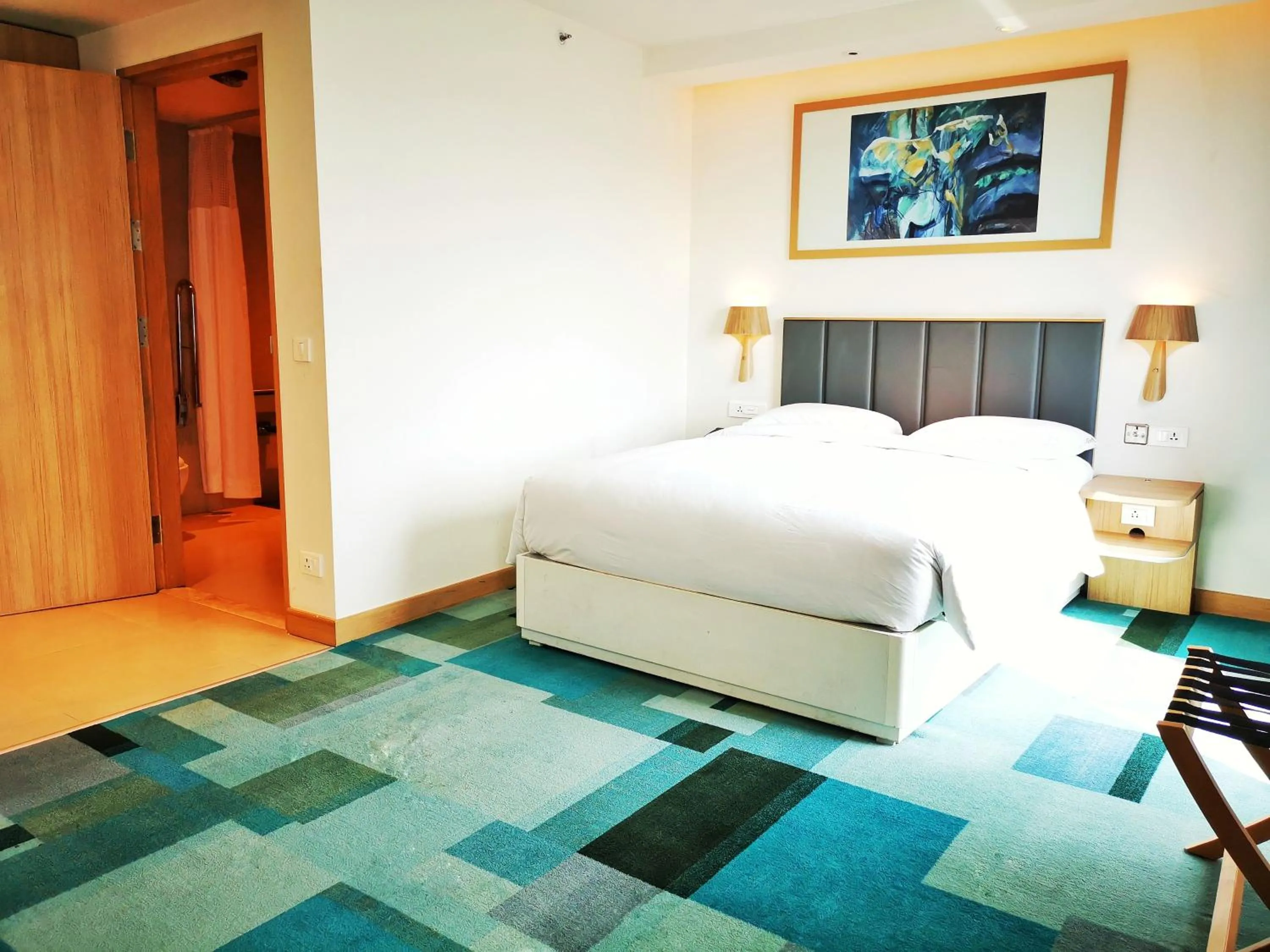 Bedroom, Bed in Holiday Inn Bengaluru Racecourse by IHG
