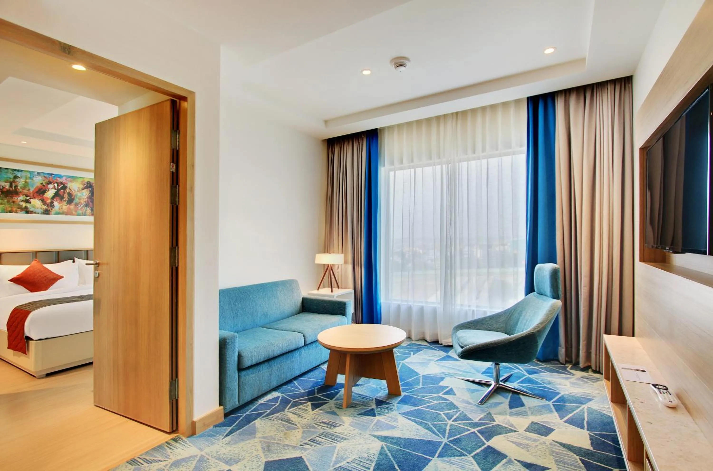 Bedroom, Bed in Holiday Inn Bengaluru Racecourse by IHG