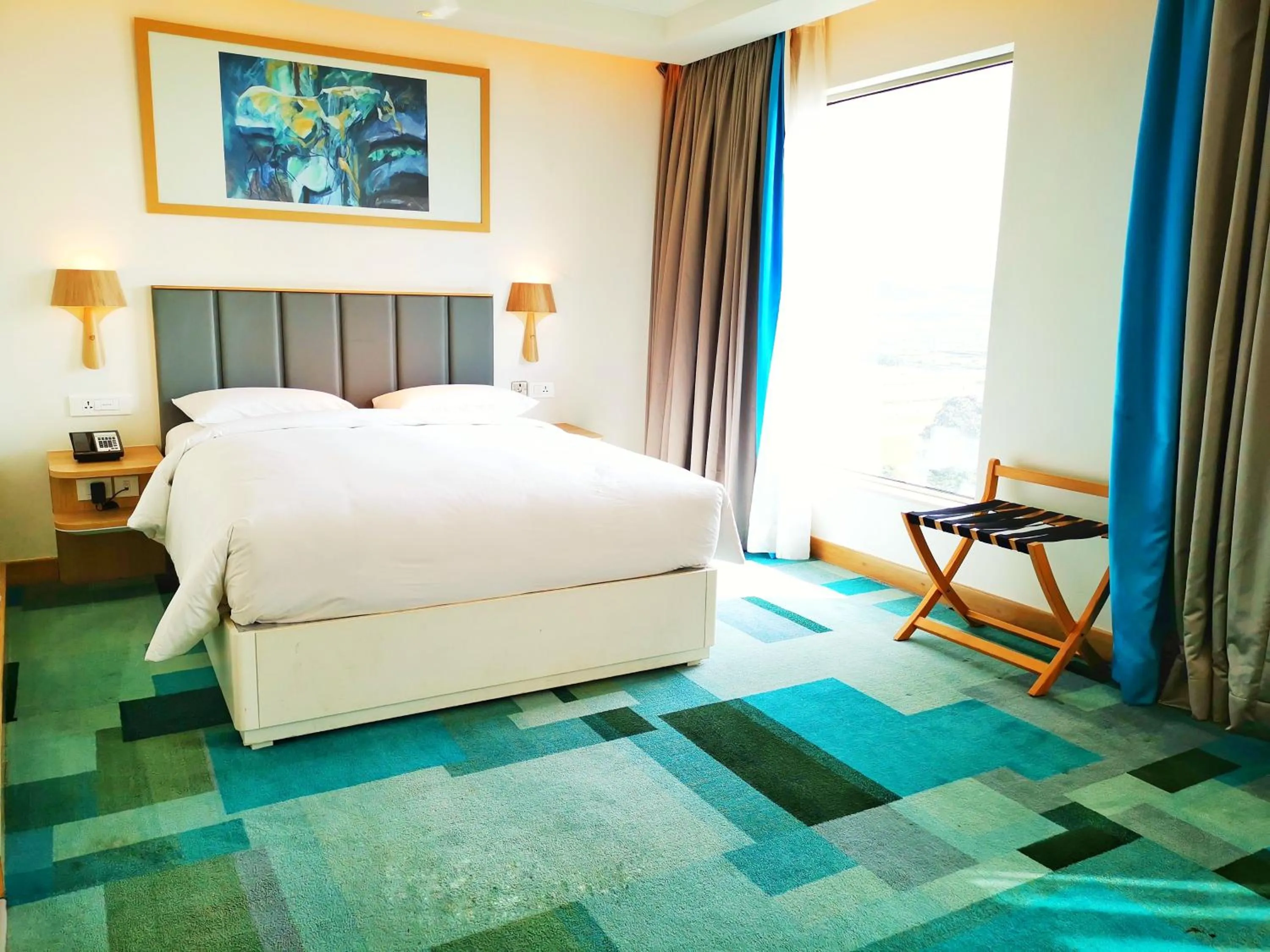 Bedroom, Bed in Holiday Inn Bengaluru Racecourse by IHG