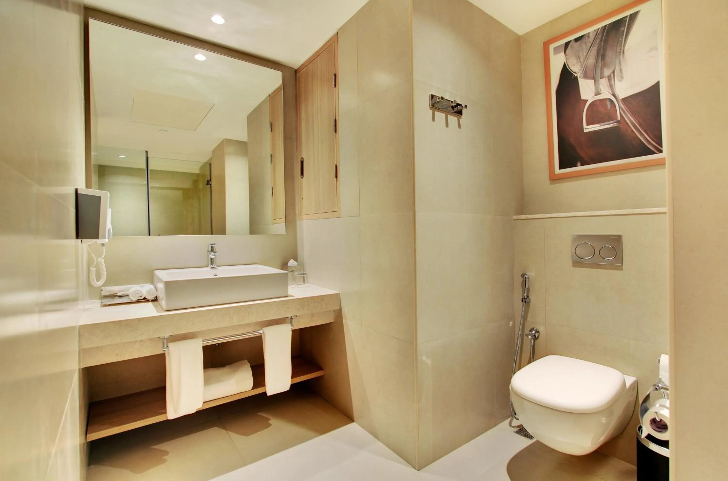 Bathroom in Holiday Inn Bengaluru Racecourse by IHG