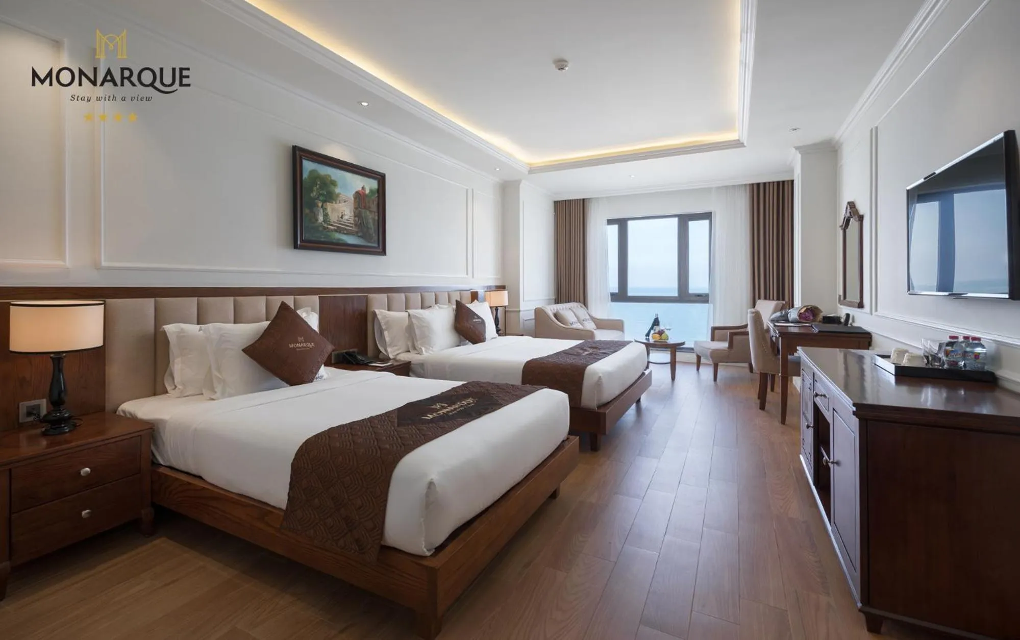 Photo of the whole room, Bed in Monarque Hotel Danang