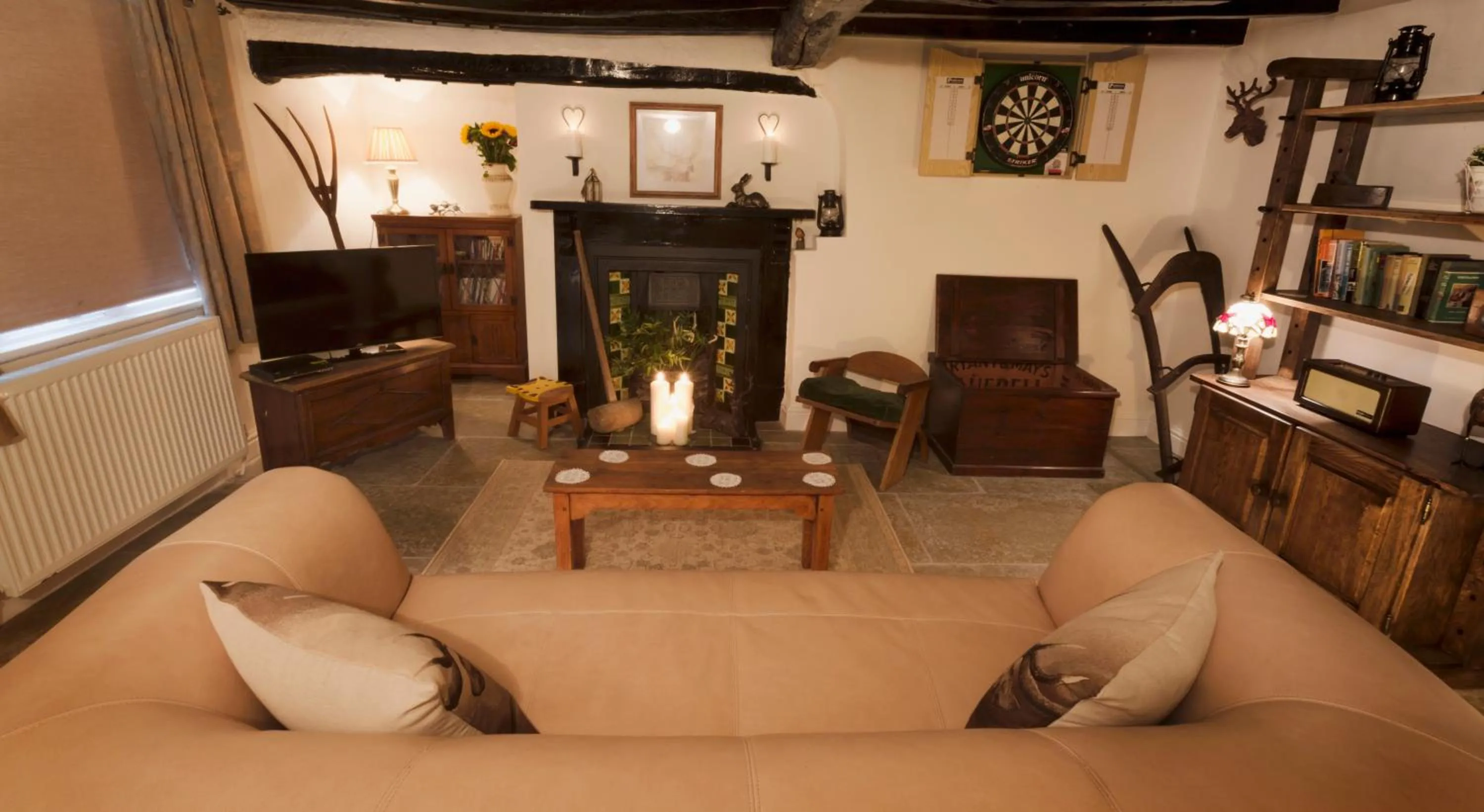 Communal lounge/ TV room in Blue Bell Cottage