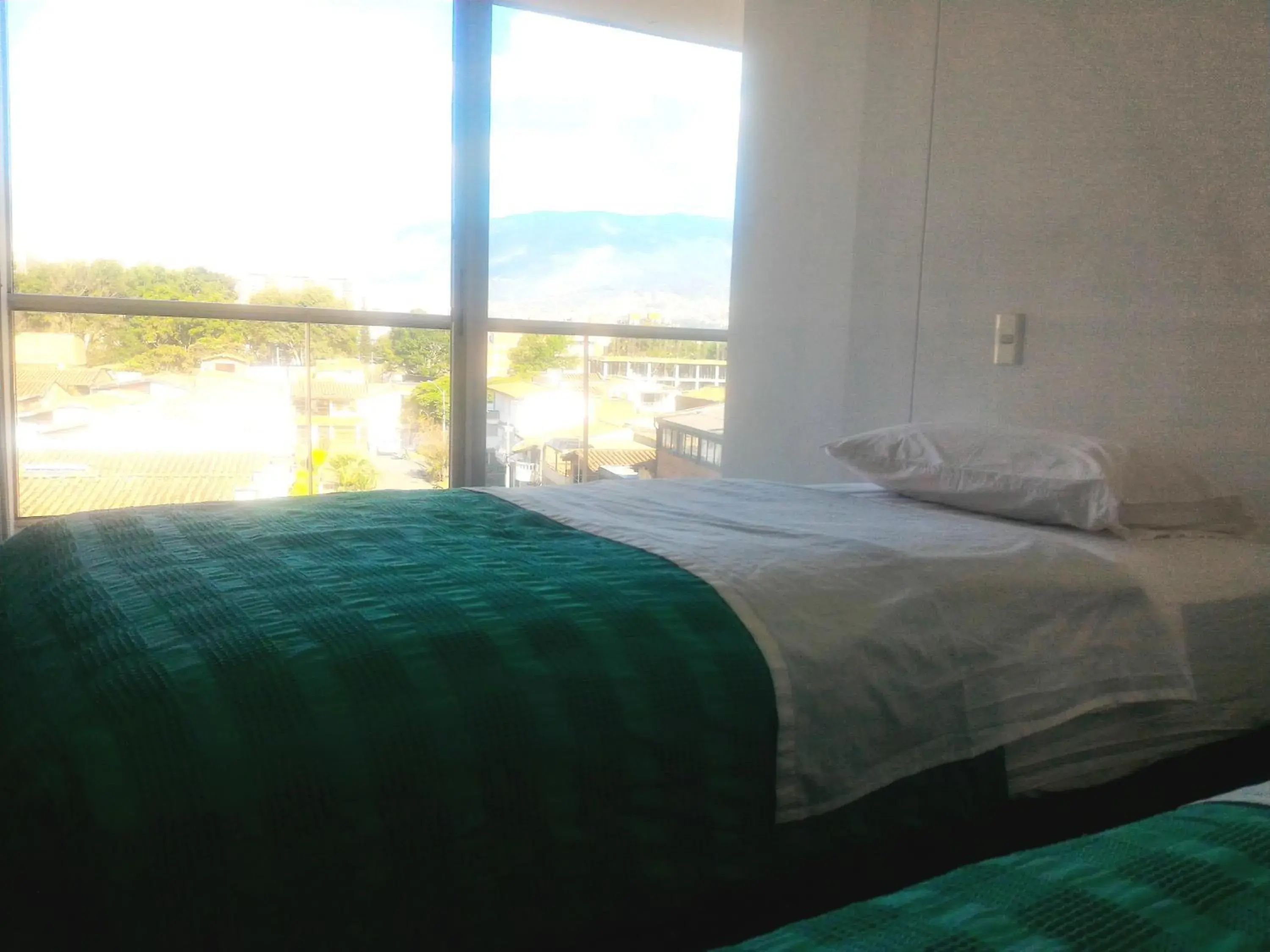 Decorative detail, Bed in Hotel CSI Medellín Decorative detail, Bed in Hotel CSI Medellín