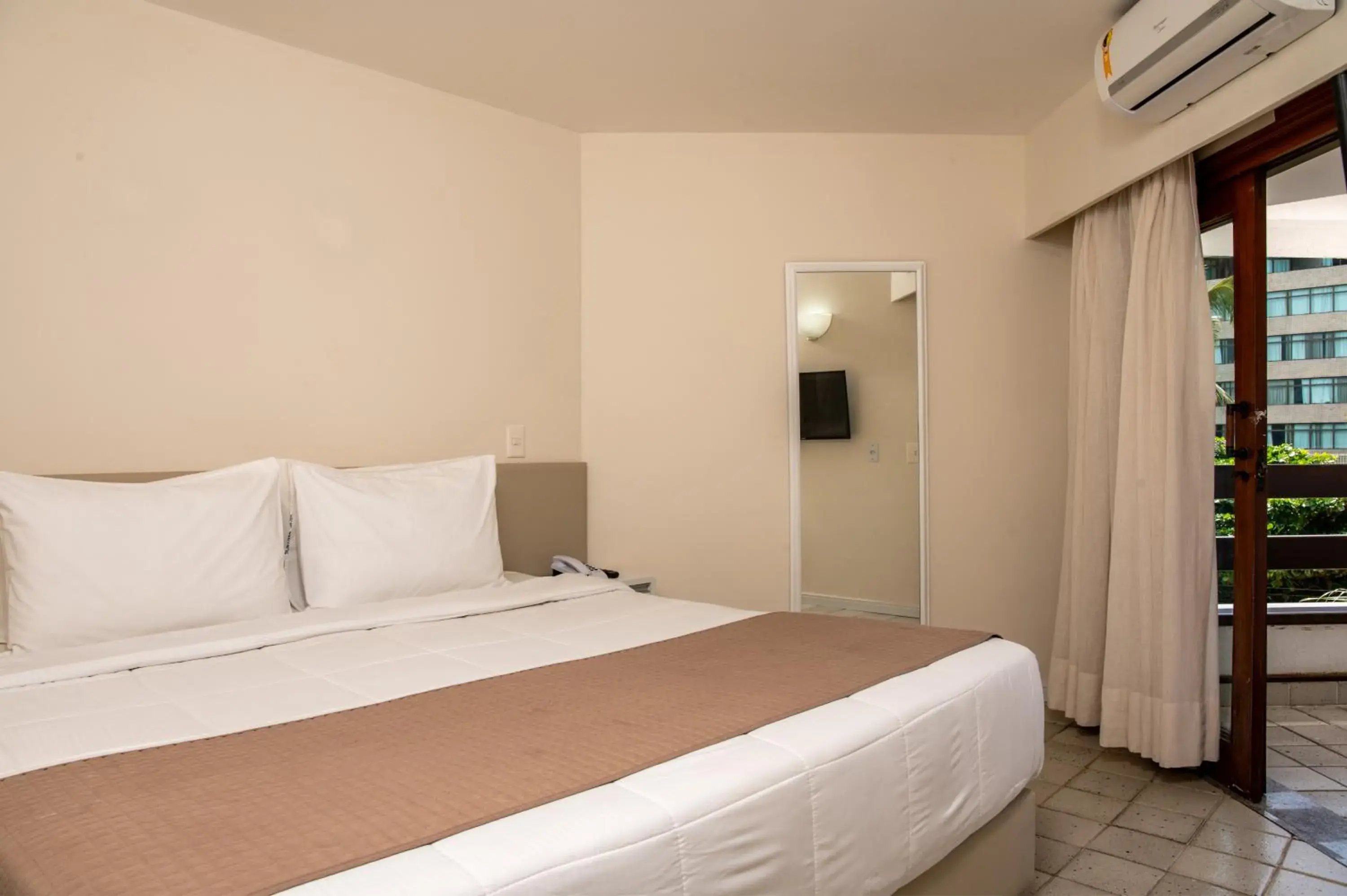 Bed in Jatiúca Suites Resort by Slaviero Hotéis Bed in Jatiúca Suites Resort by Slaviero Hotéis