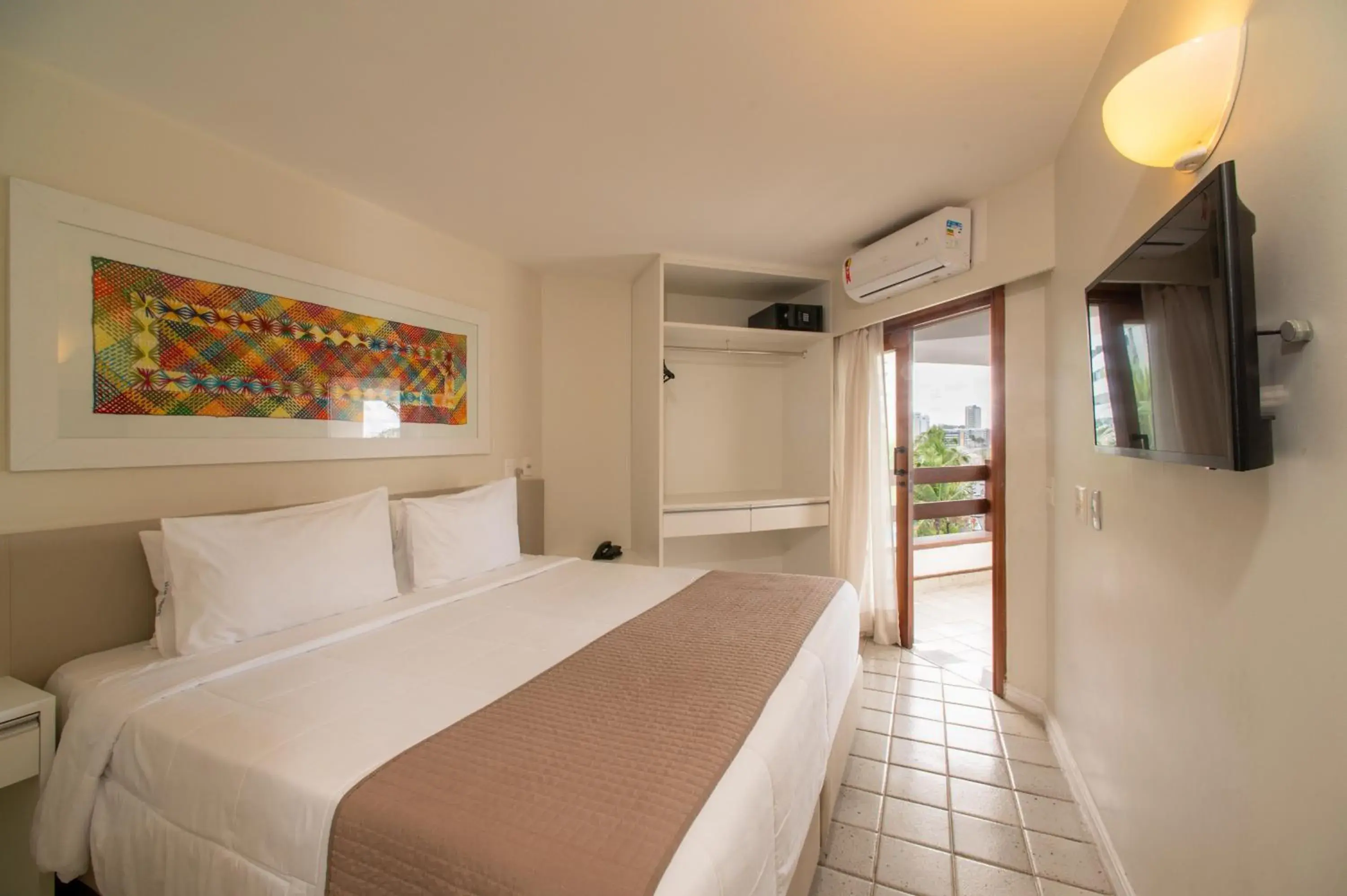 Bed in Jatiúca Suites Resort by Slaviero Hotéis Bed in Jatiúca Suites Resort by Slaviero Hotéis