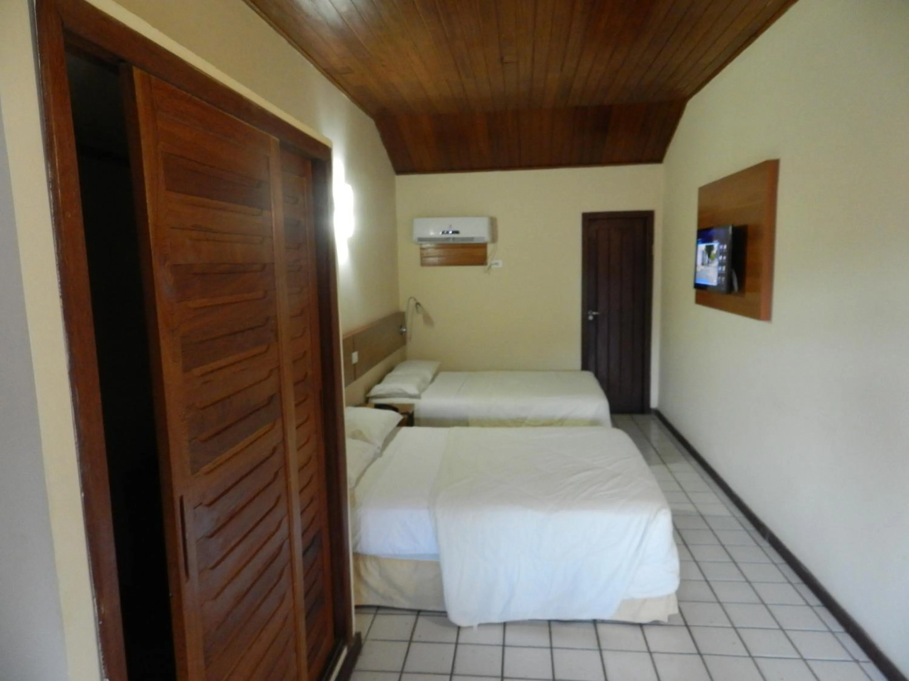 Bedroom, Bed in Monte Pascoal Praia Hotel