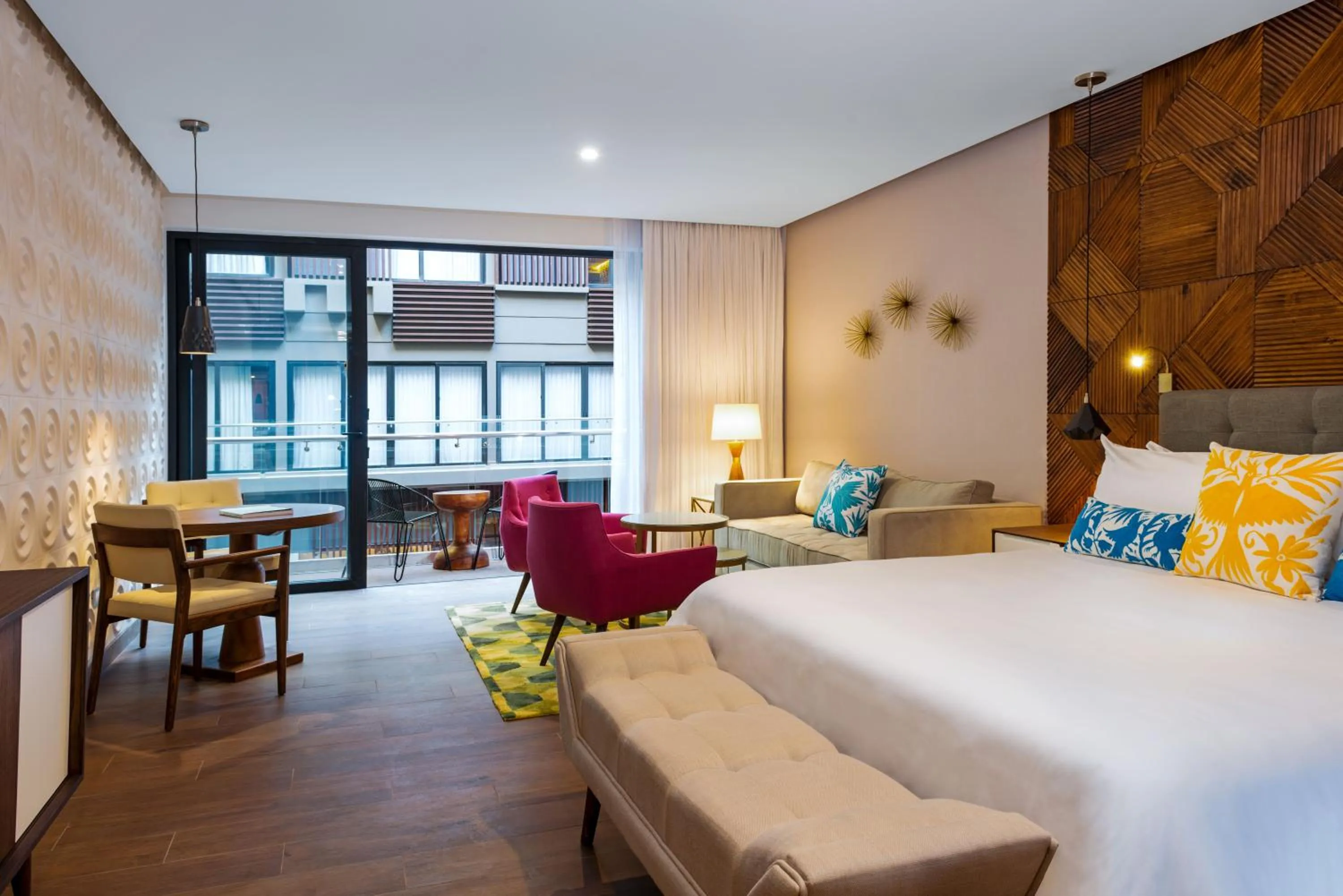 Living room, Bed in The Fives Downtown Hotel & Residences, Curio Collection by Hilton