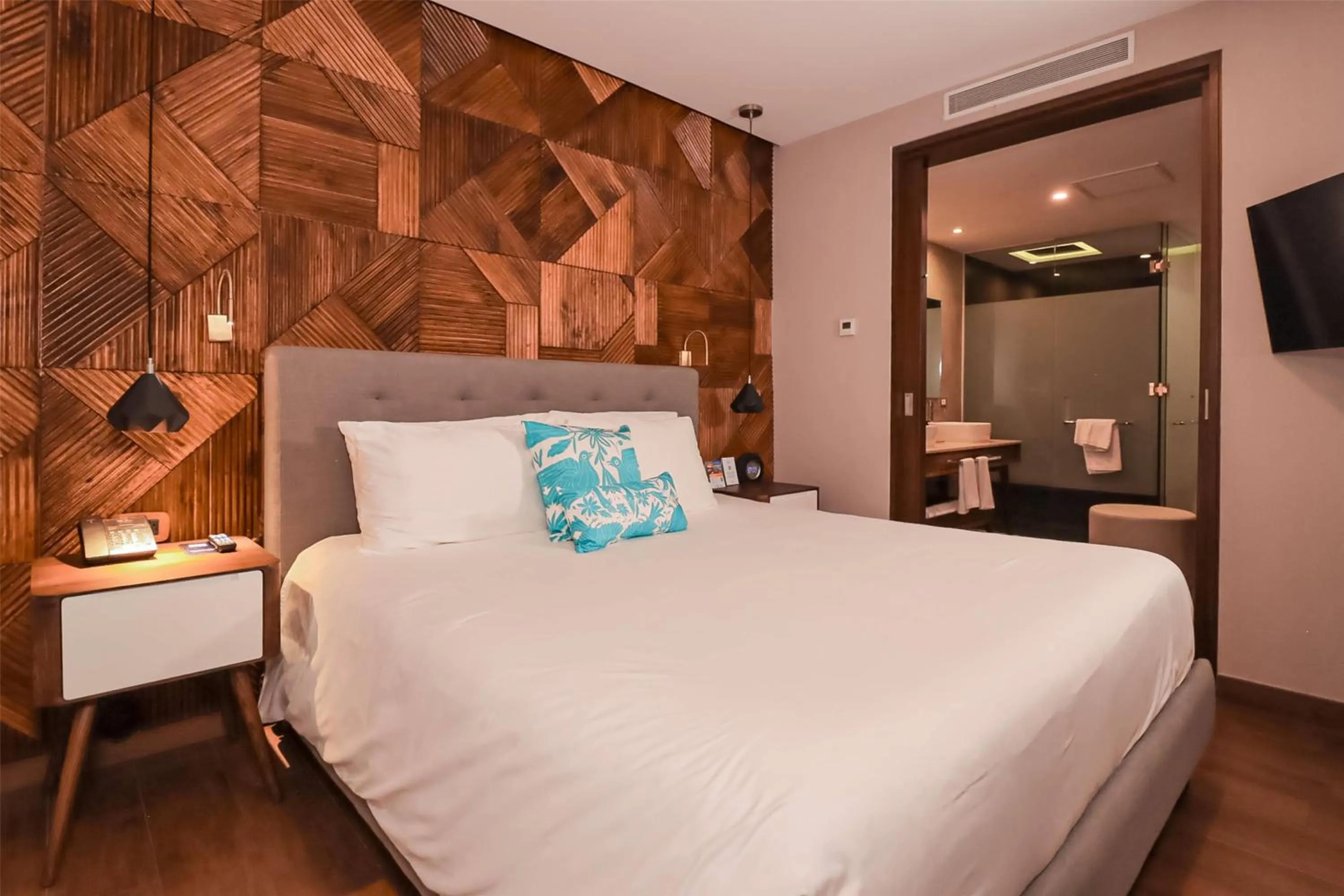 Bathroom, Bed in The Fives Downtown Hotel & Residences, Curio Collection by Hilton