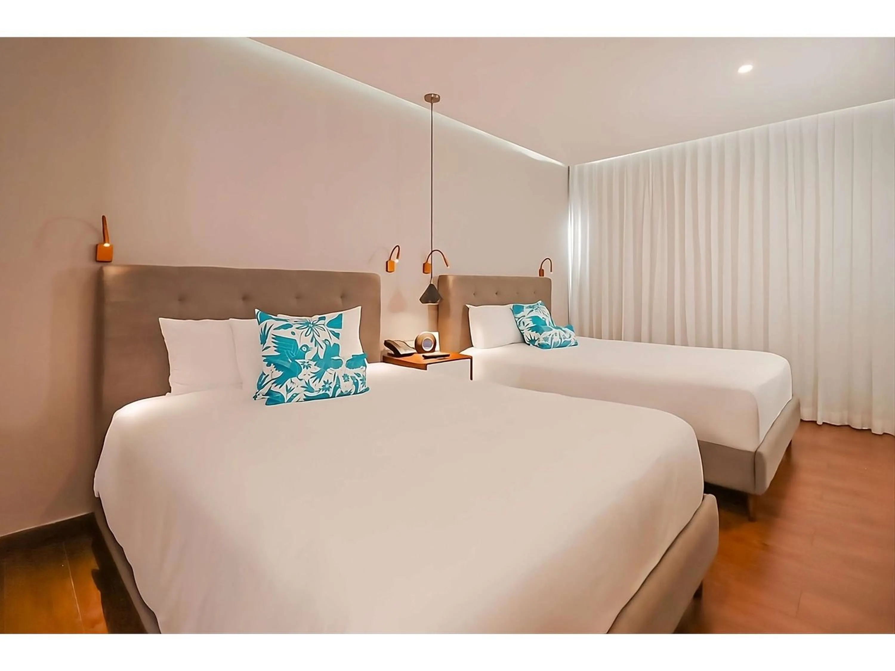 Bed in The Fives Downtown Hotel & Residences, Curio Collection by Hilton
