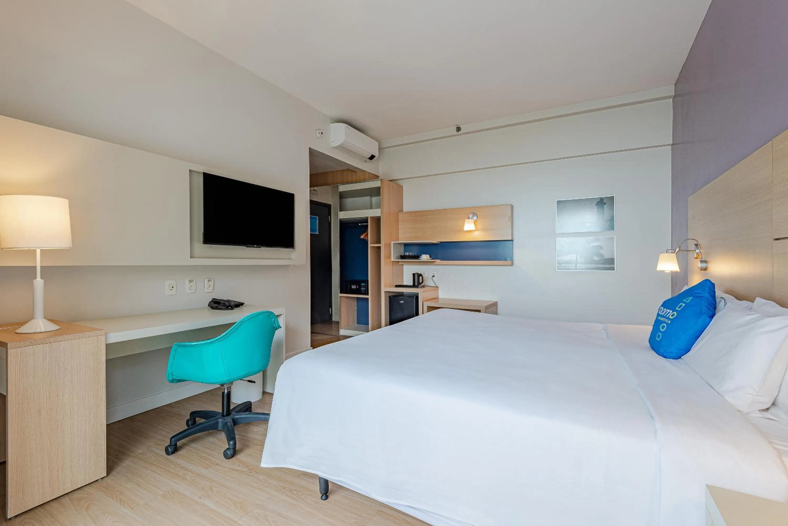 Bed in Roomo Transamerica Santos Gonzaga