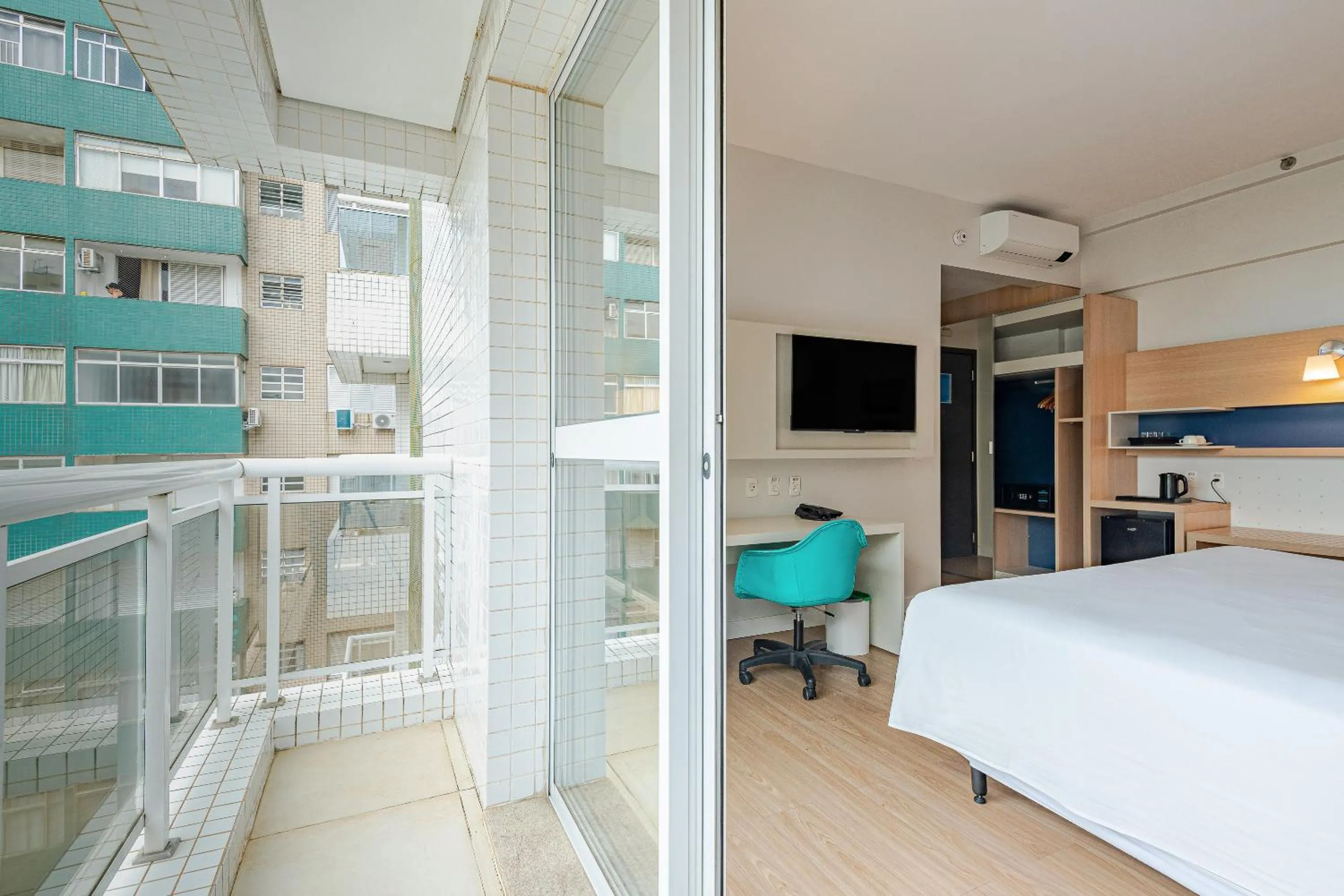 Bed in Roomo Transamerica Santos Gonzaga