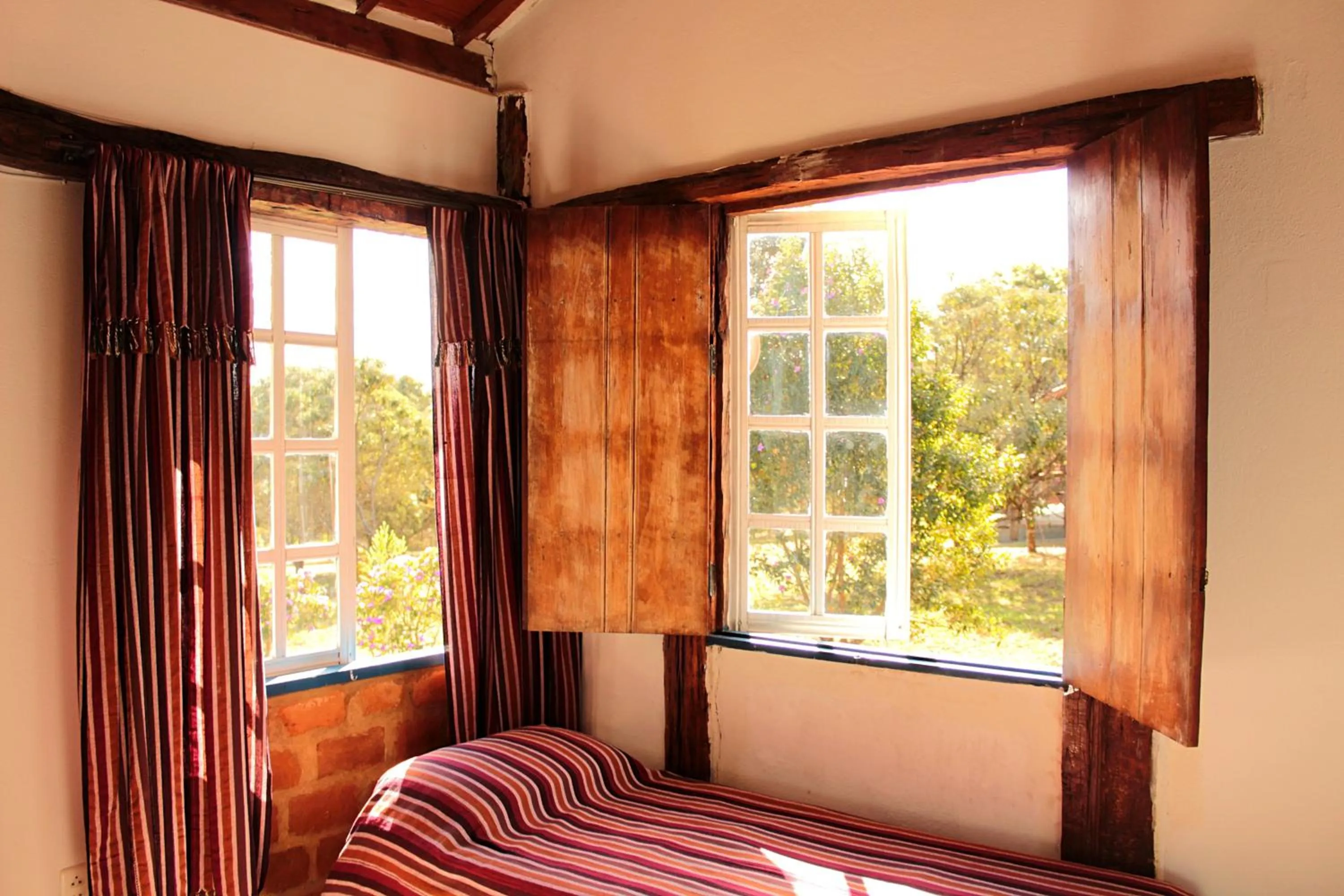 Bed in Pousada Chalé Terra Viva