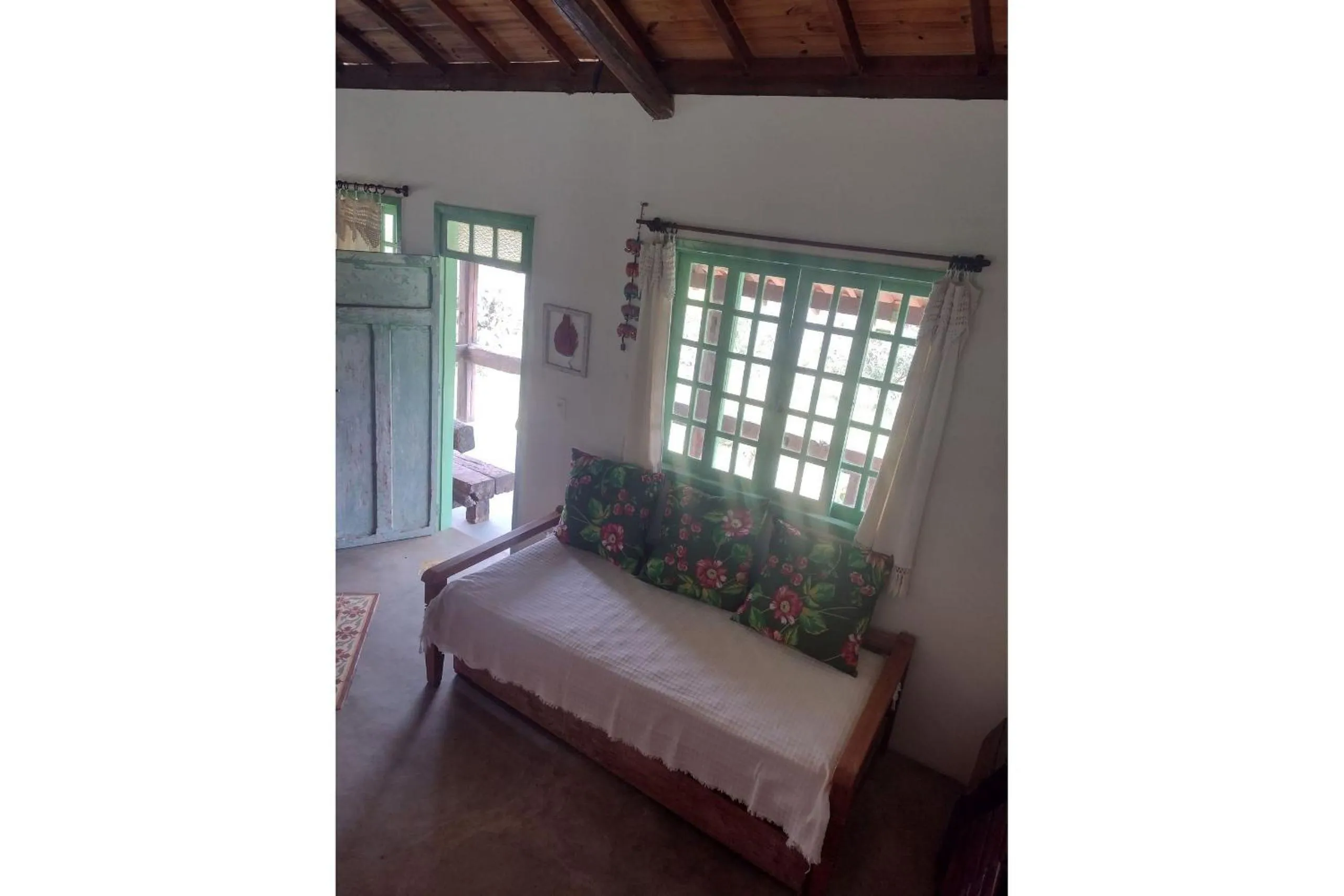 Living room, Bed in Pousada Chalé Terra Viva