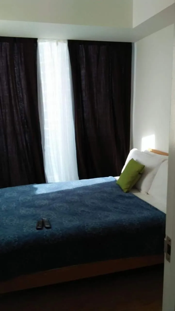 Bed in Azure Residences by Van Florendo