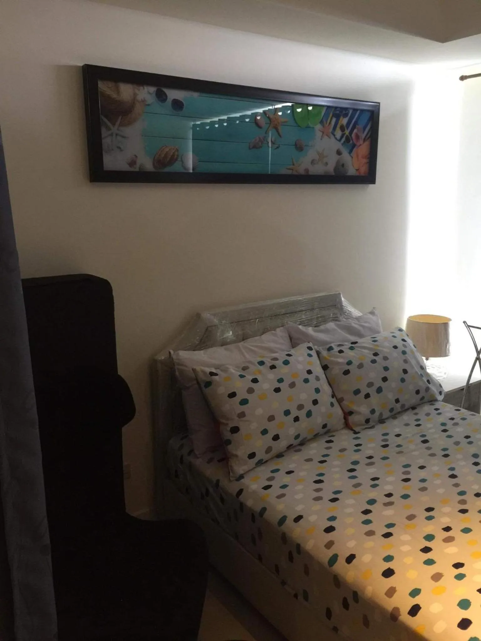 Bed in Azure Residences by Van Florendo