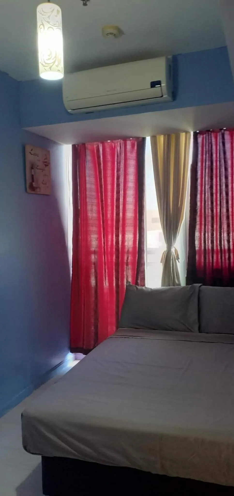 Bed in Azure Residences by Van Florendo