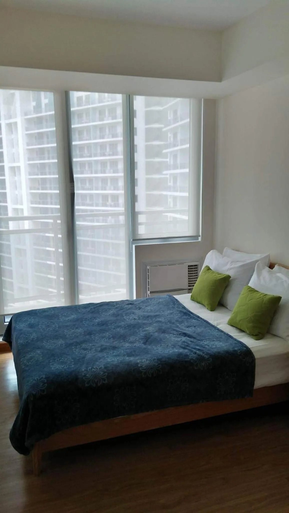 Bed in Azure Residences by Van Florendo