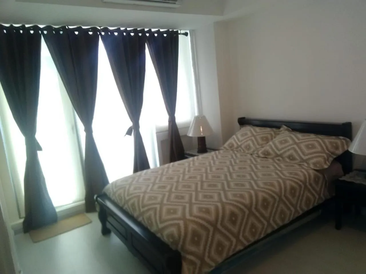 Bed in Azure Residences by Van Florendo