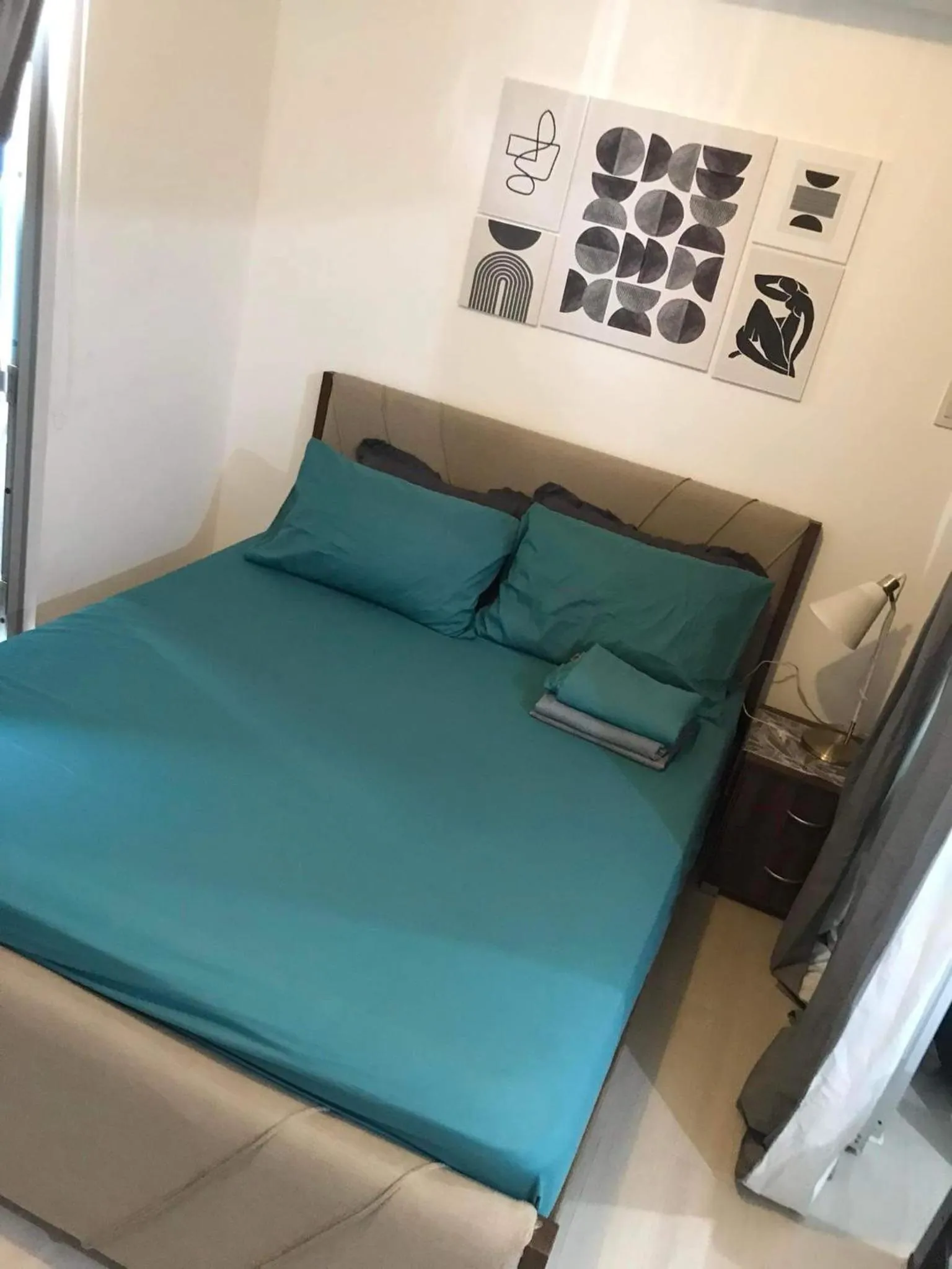Bed in Azure Residences by Van Florendo