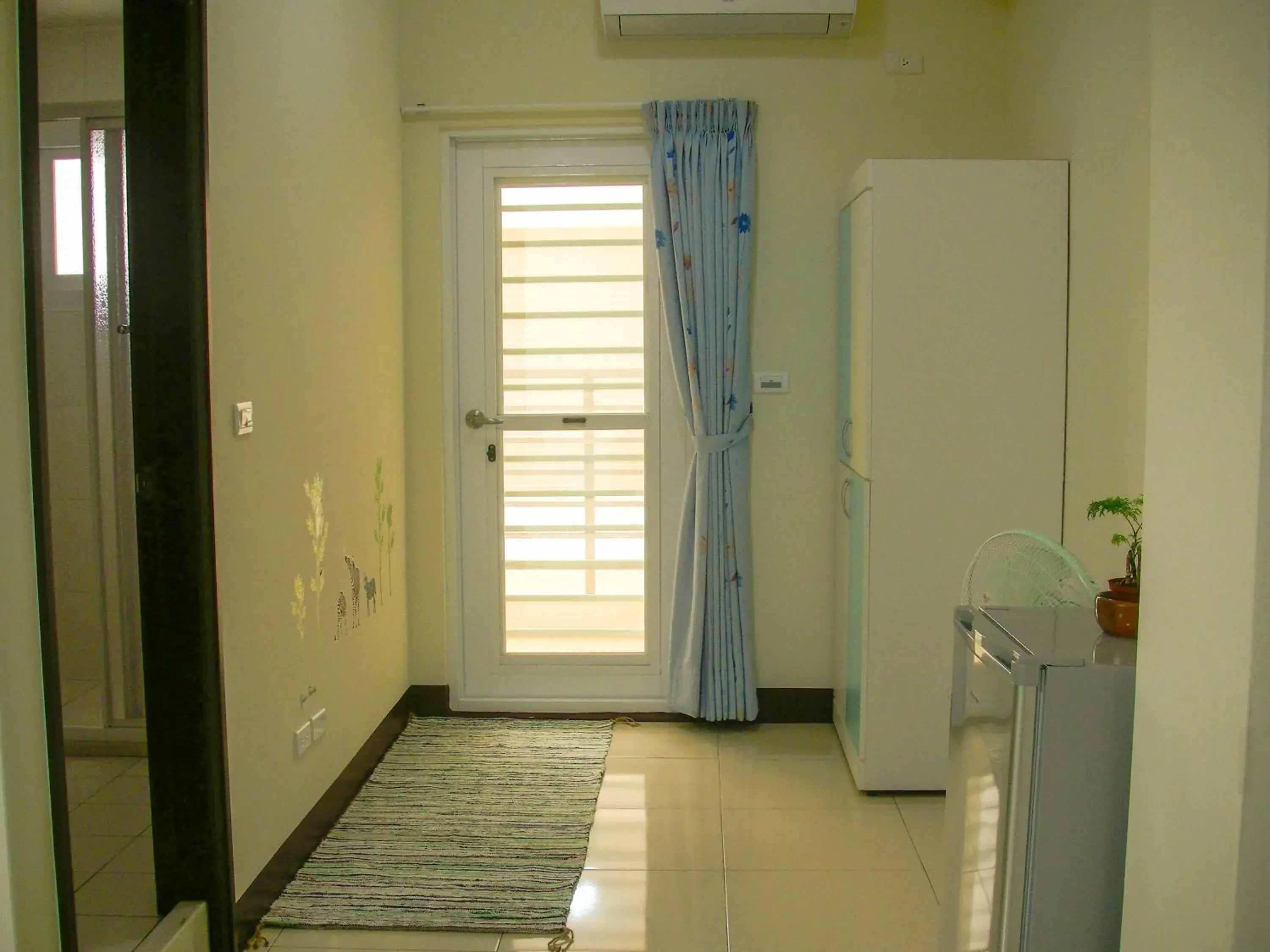 Quadruple Room with Balcony in Jun Le Bed and Breakfast Quadruple Room with Balcony in Jun Le Bed and Breakfast