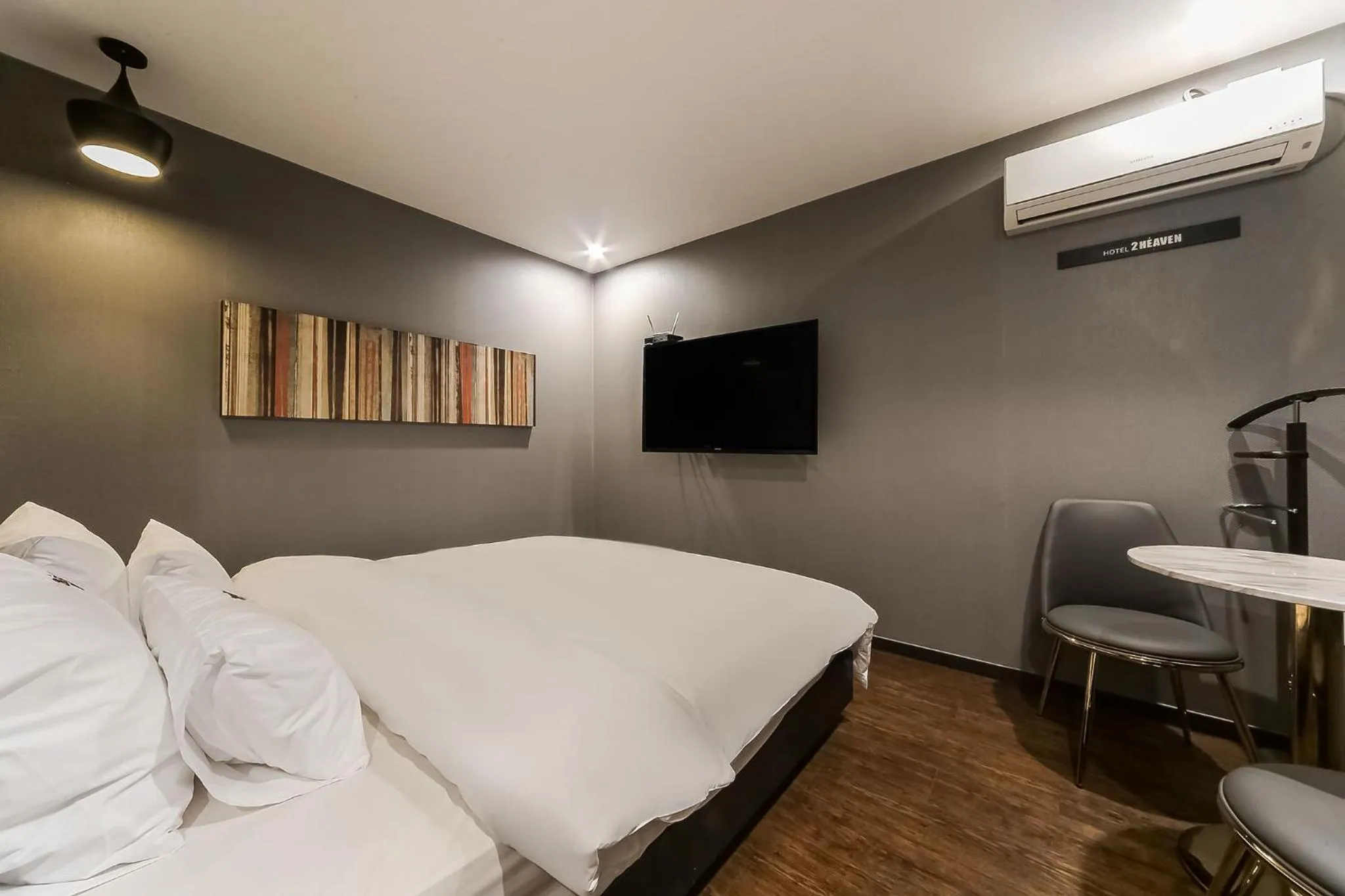 Bed in 2 Heaven Hotel Songdo