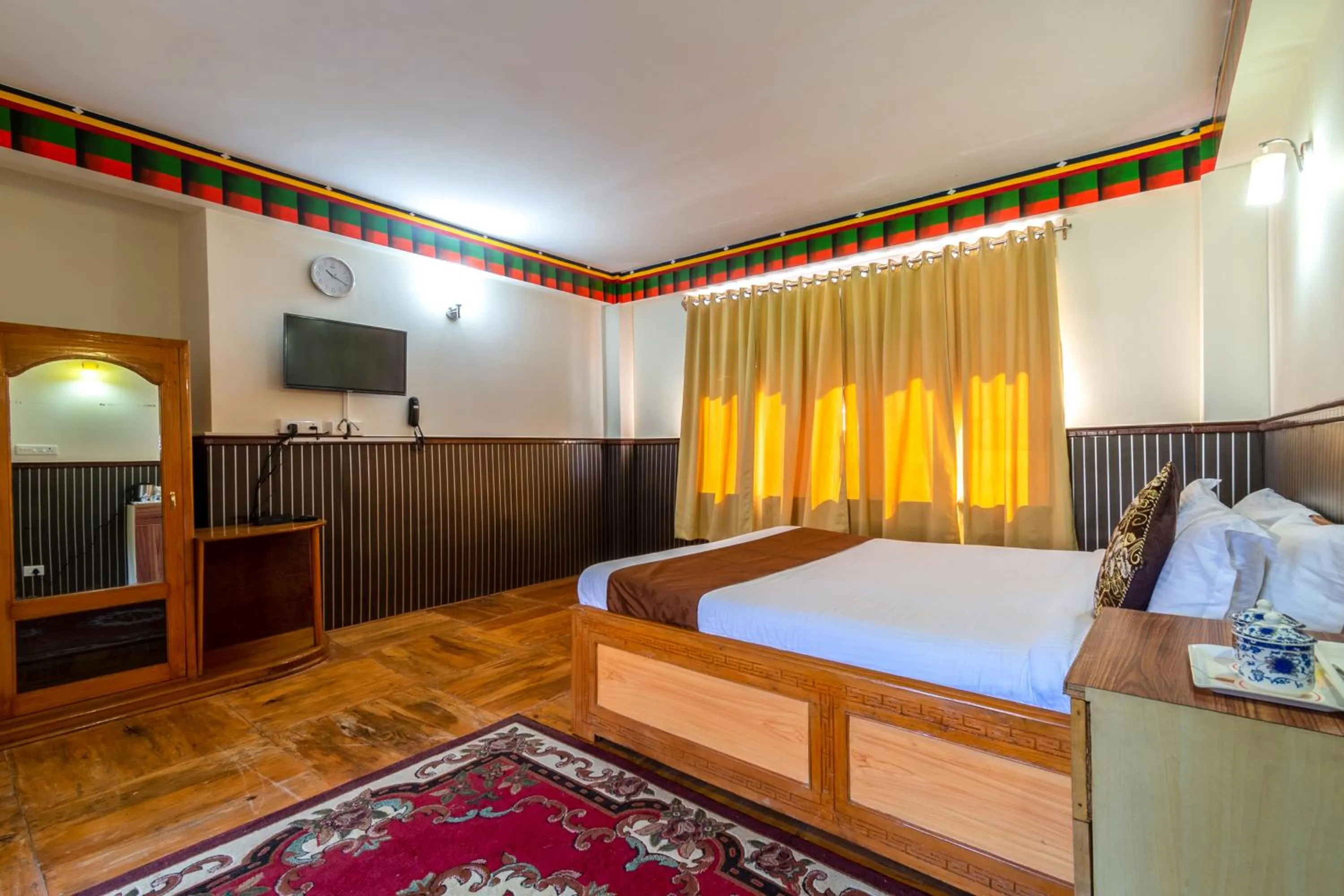 Photo of the whole room, Bed in Magellan's The Grand Lachen