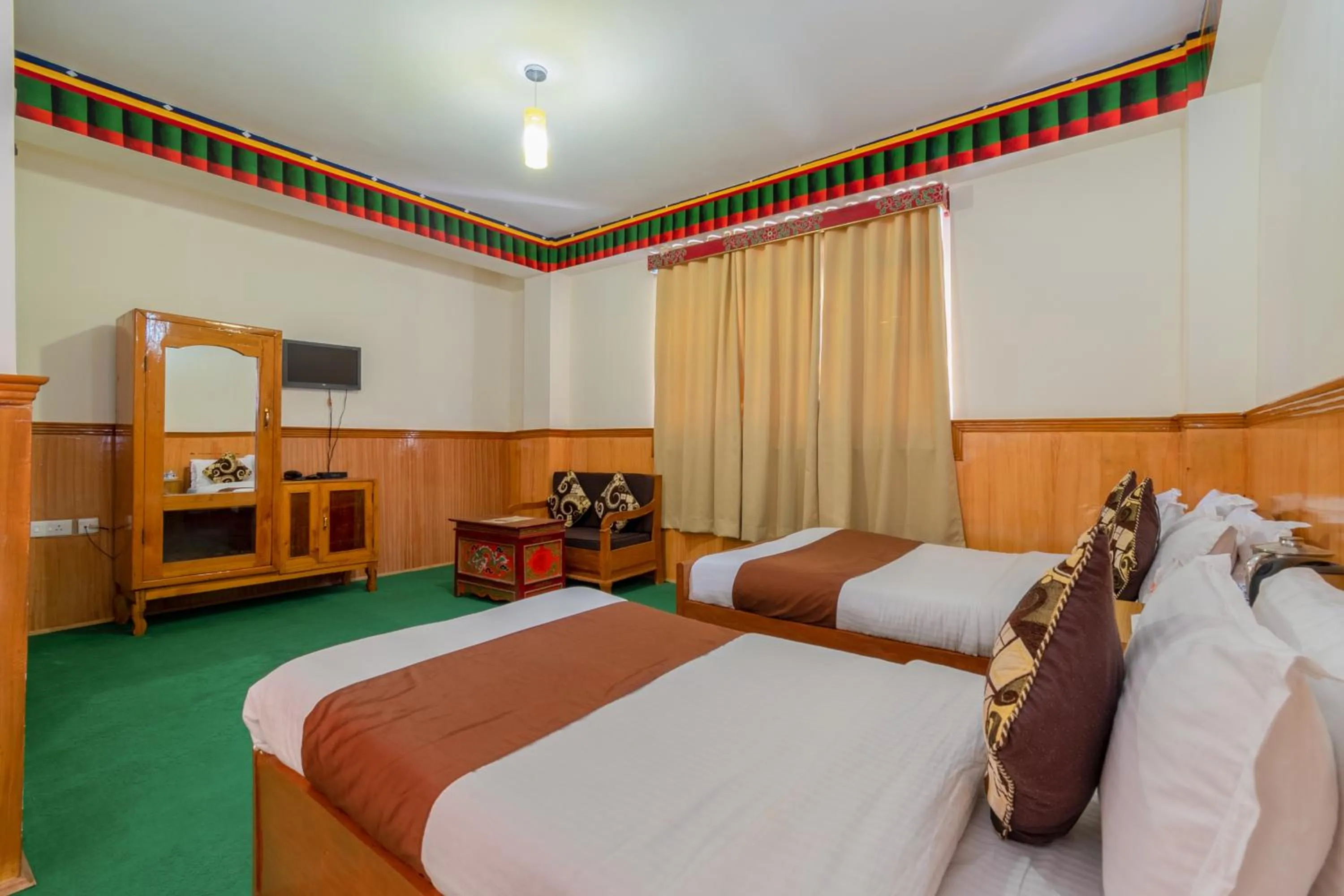 Photo of the whole room, Bed in Magellan's The Grand Lachen