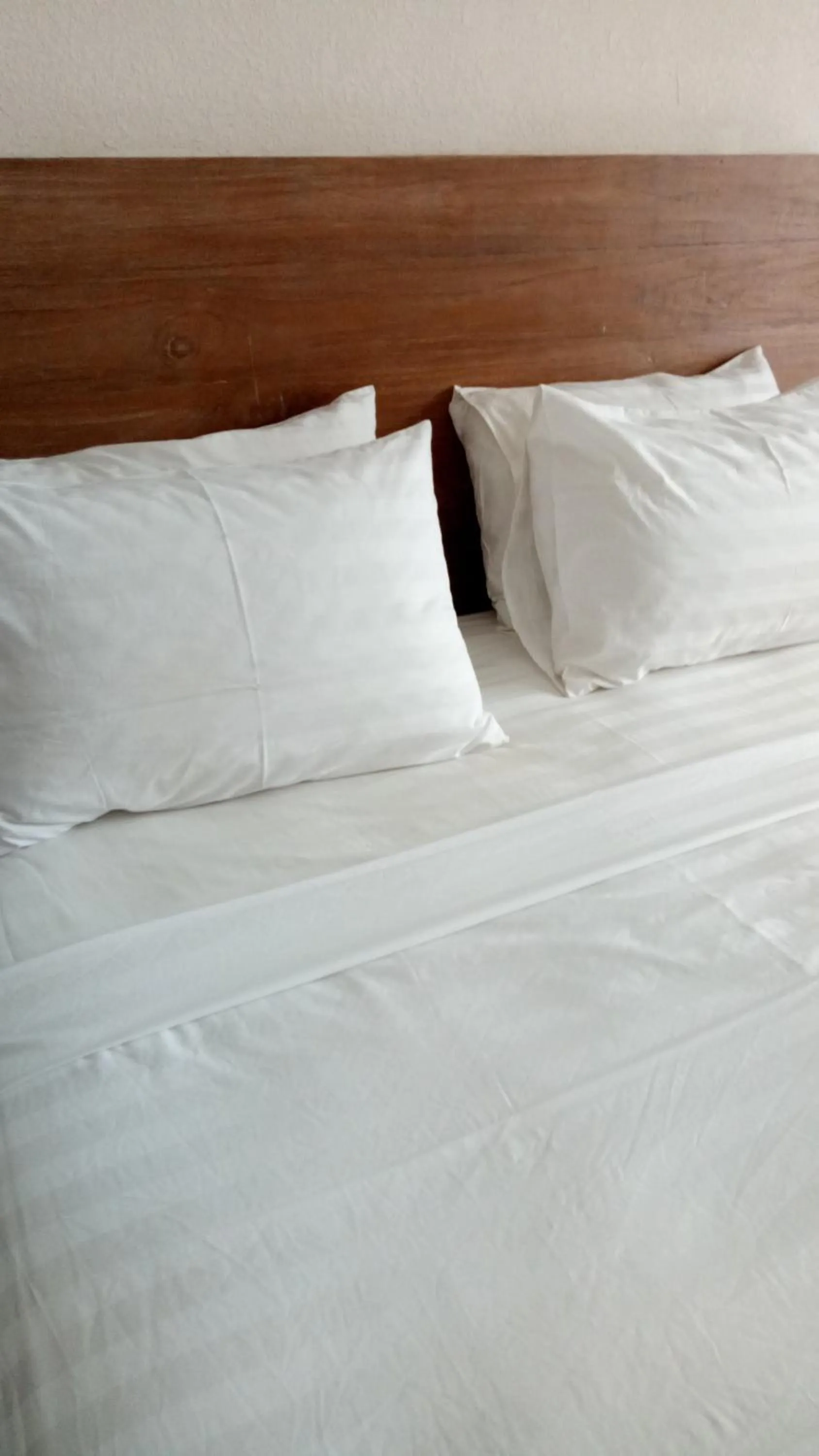 Bed in The 5 Brothers Hotel