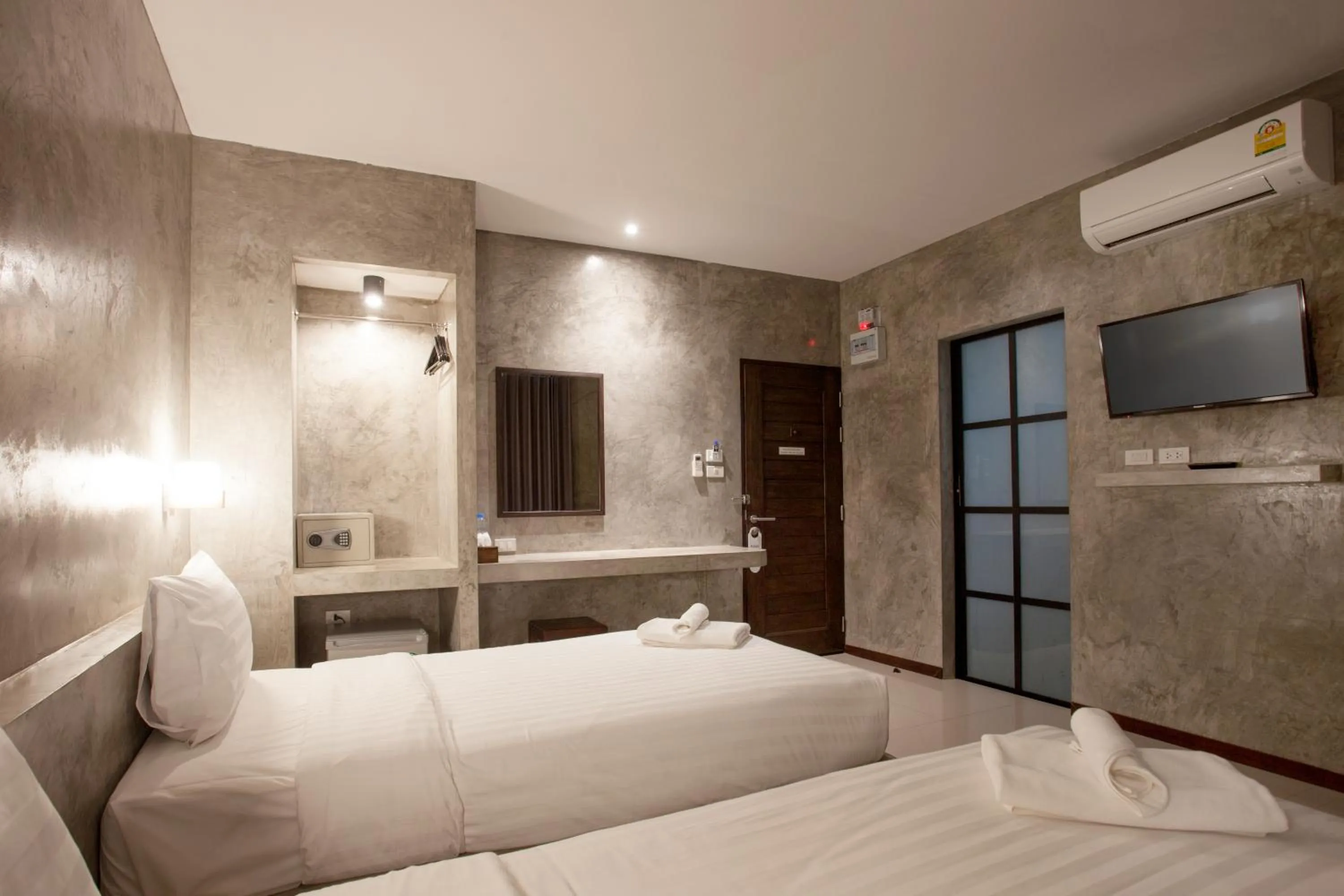 Bed in Ritsurin Boutique Hotel - โรงแรมริทสุริน บูติค