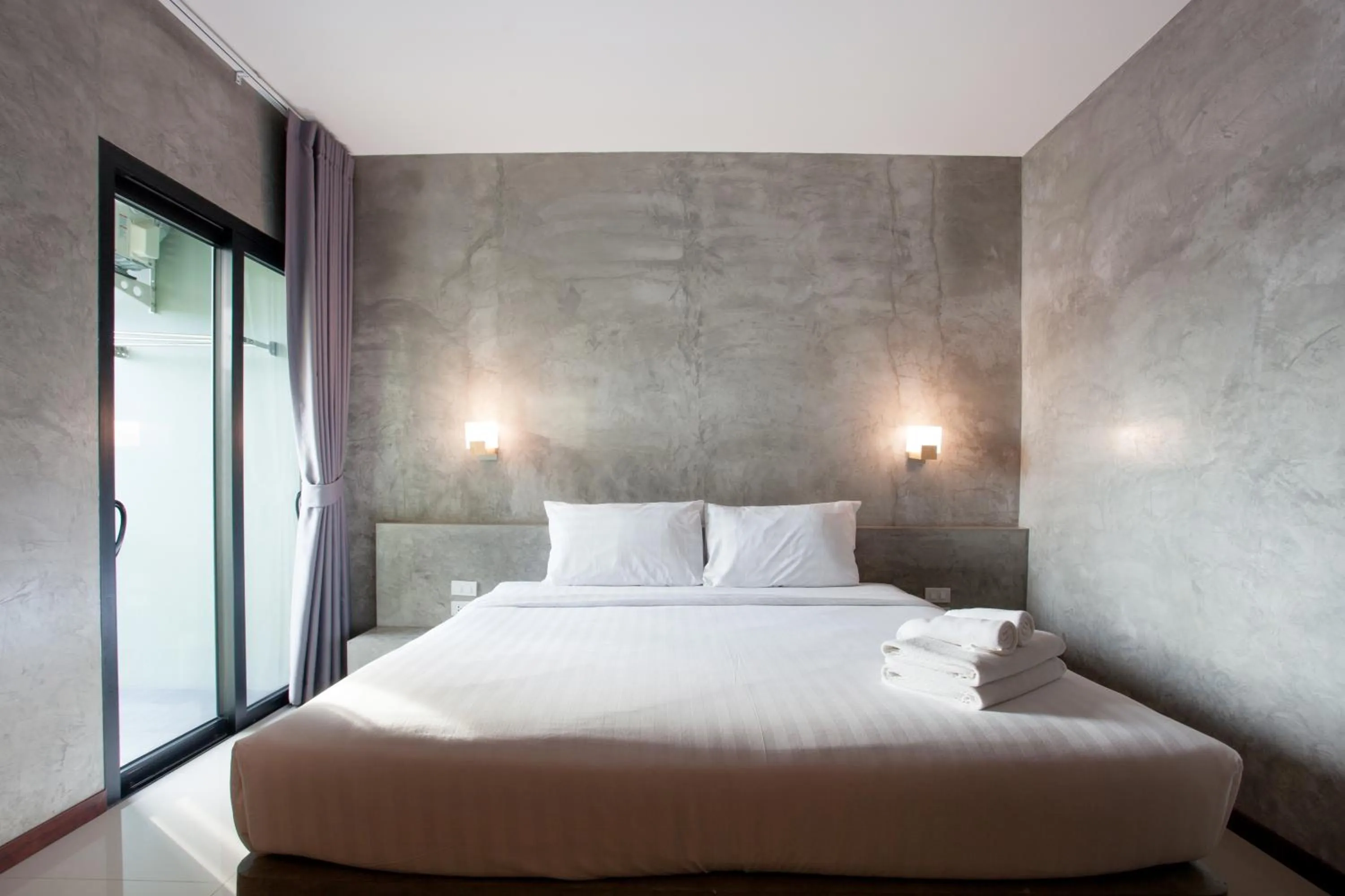 Bed in Ritsurin Boutique Hotel - โรงแรมริทสุริน บูติค