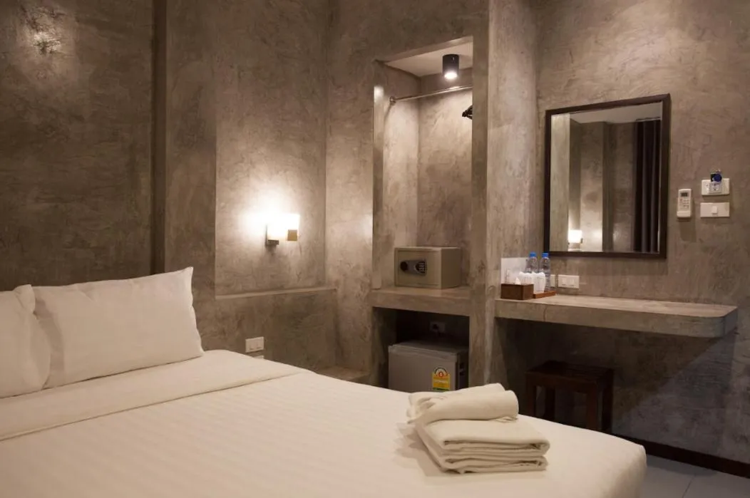 Bed in Ritsurin Boutique Hotel - โรงแรมริทสุริน บูติค