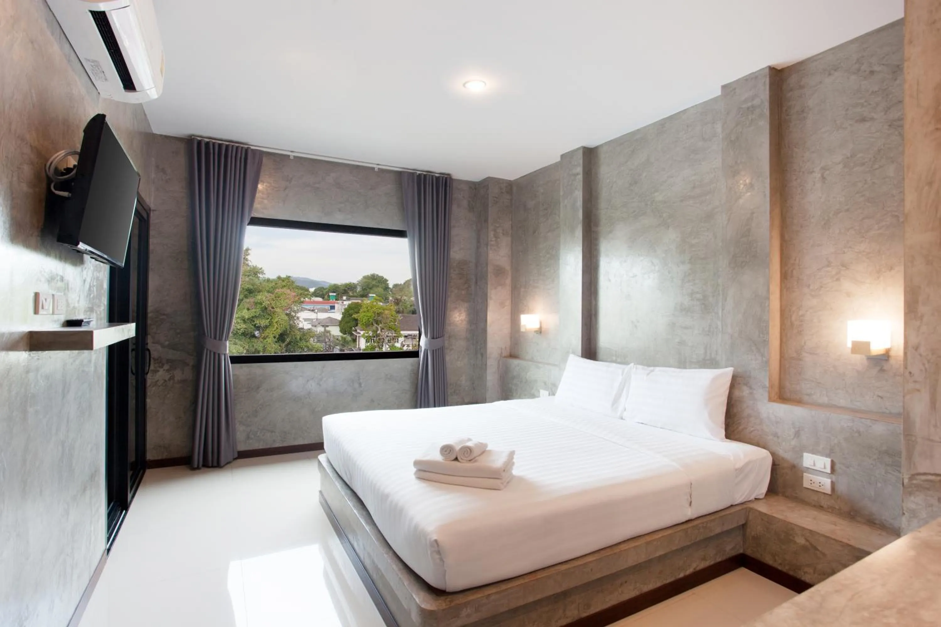 Bed in Ritsurin Boutique Hotel - โรงแรมริทสุริน บูติค