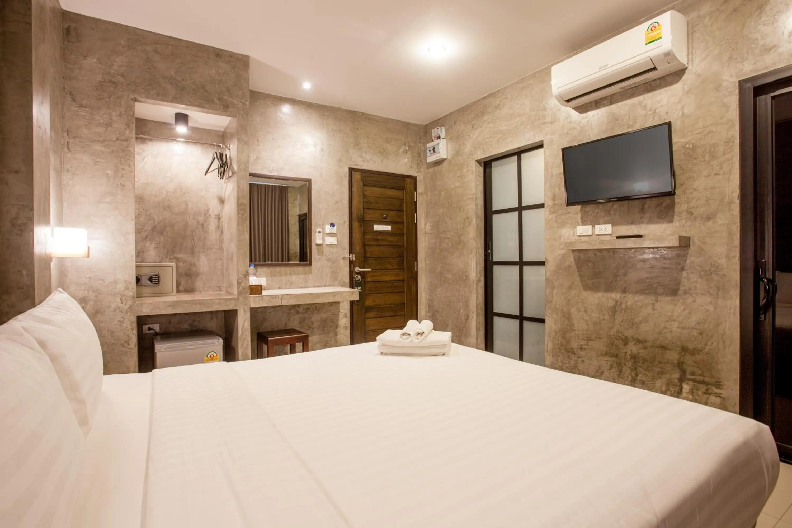 Bed in Ritsurin Boutique Hotel - โรงแรมริทสุริน บูติค