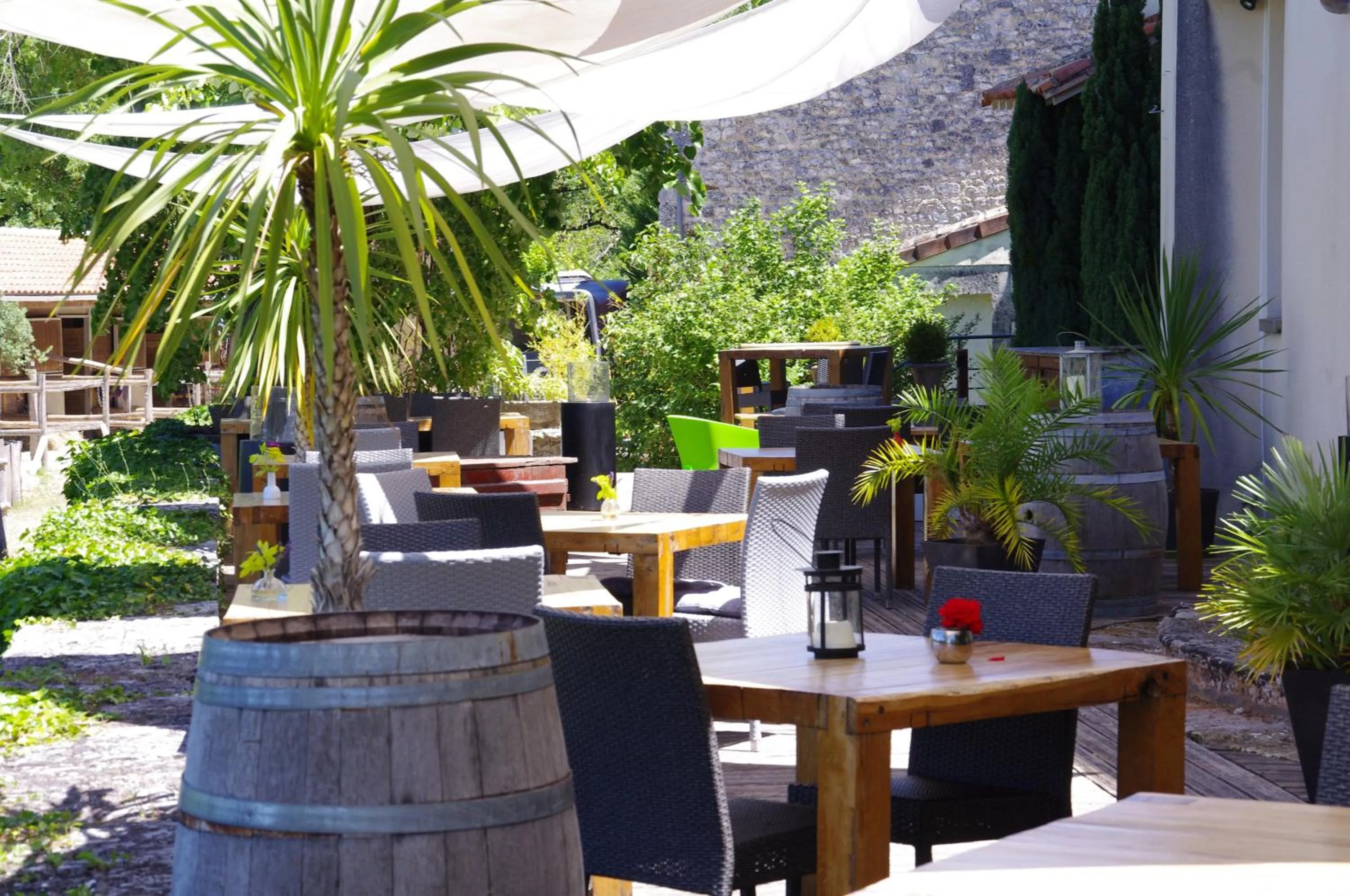 Patio in Logis Hotels Domaine du Châtelard