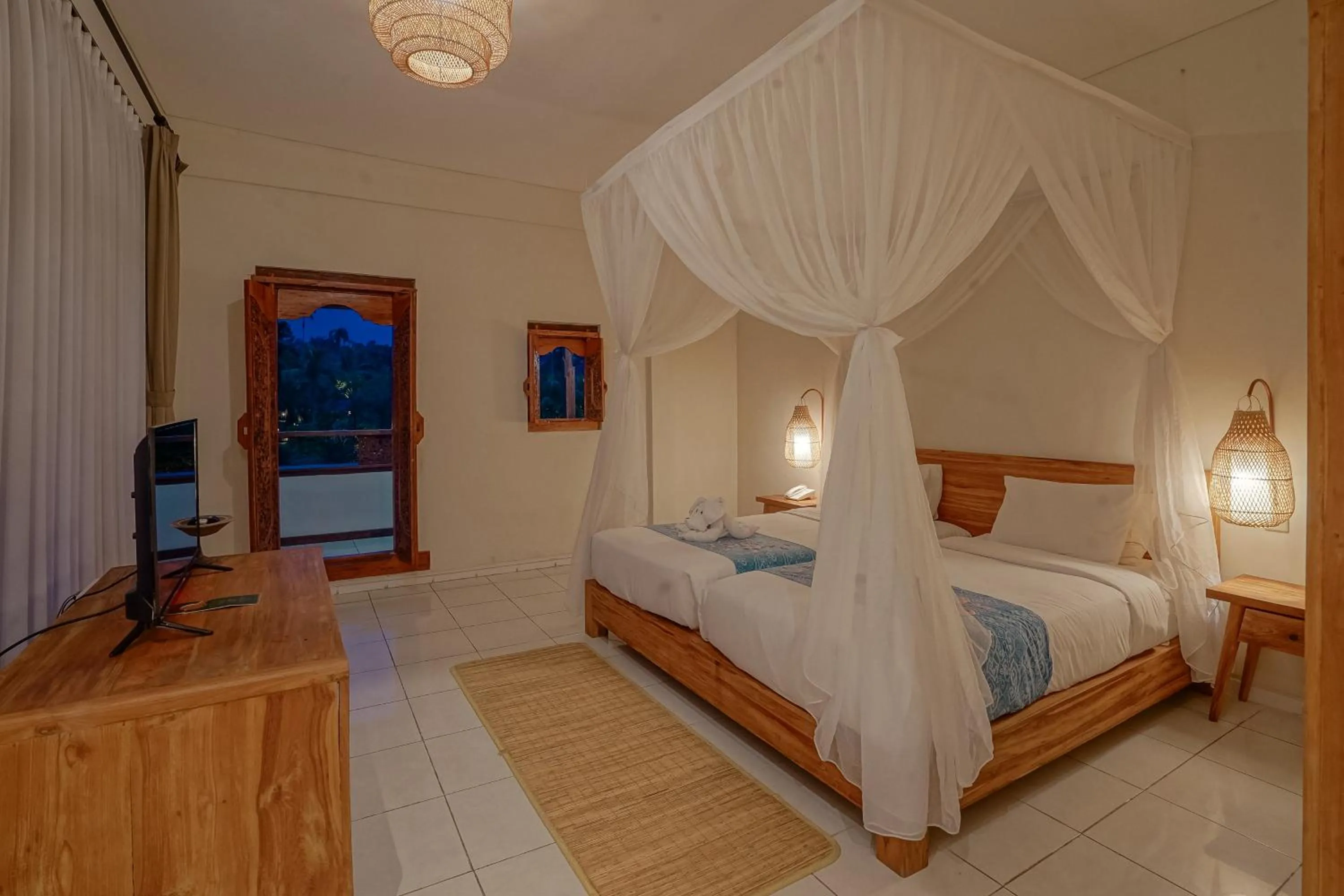 Bed in Pertiwi Resort & Spa