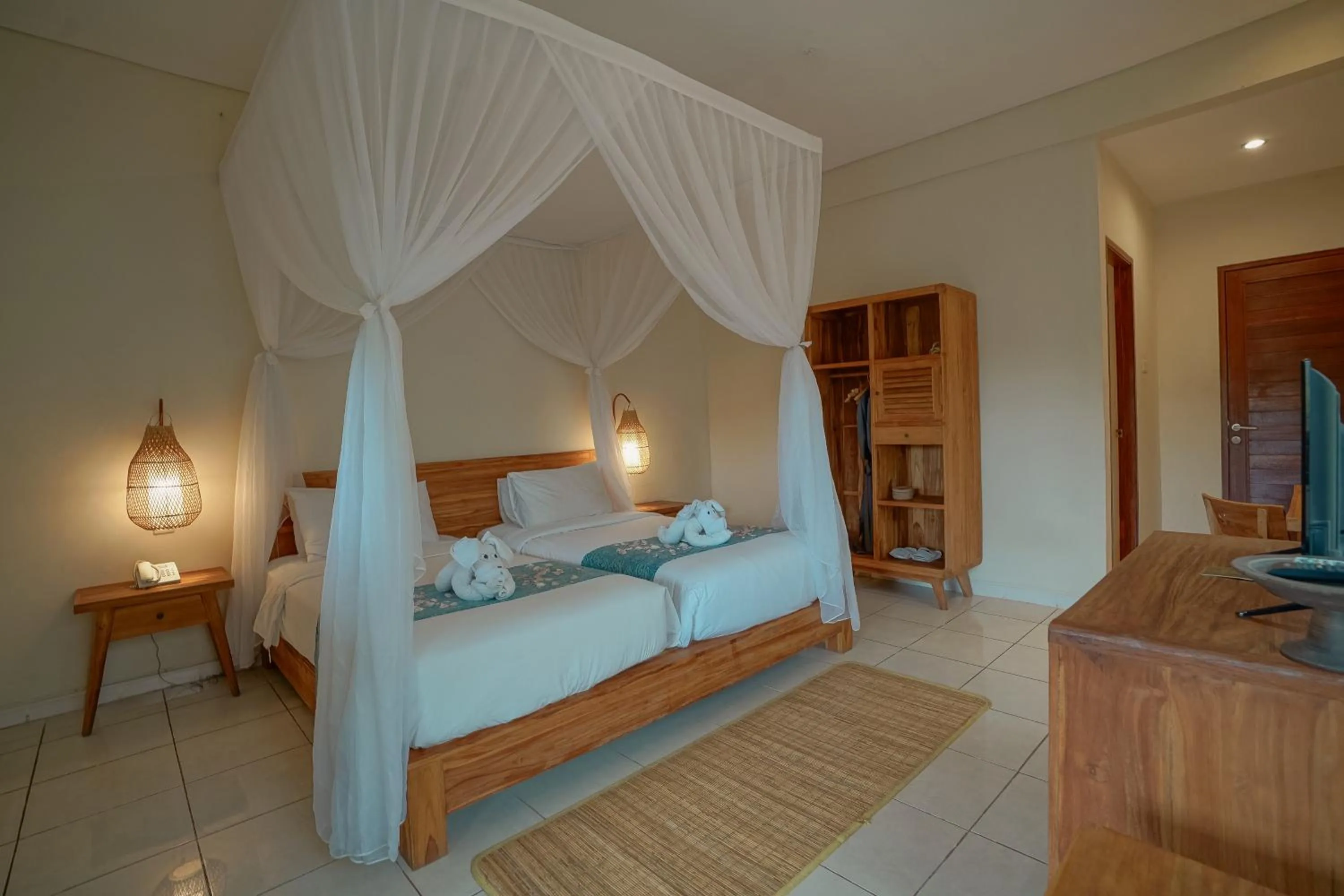 Bed in Pertiwi Resort & Spa