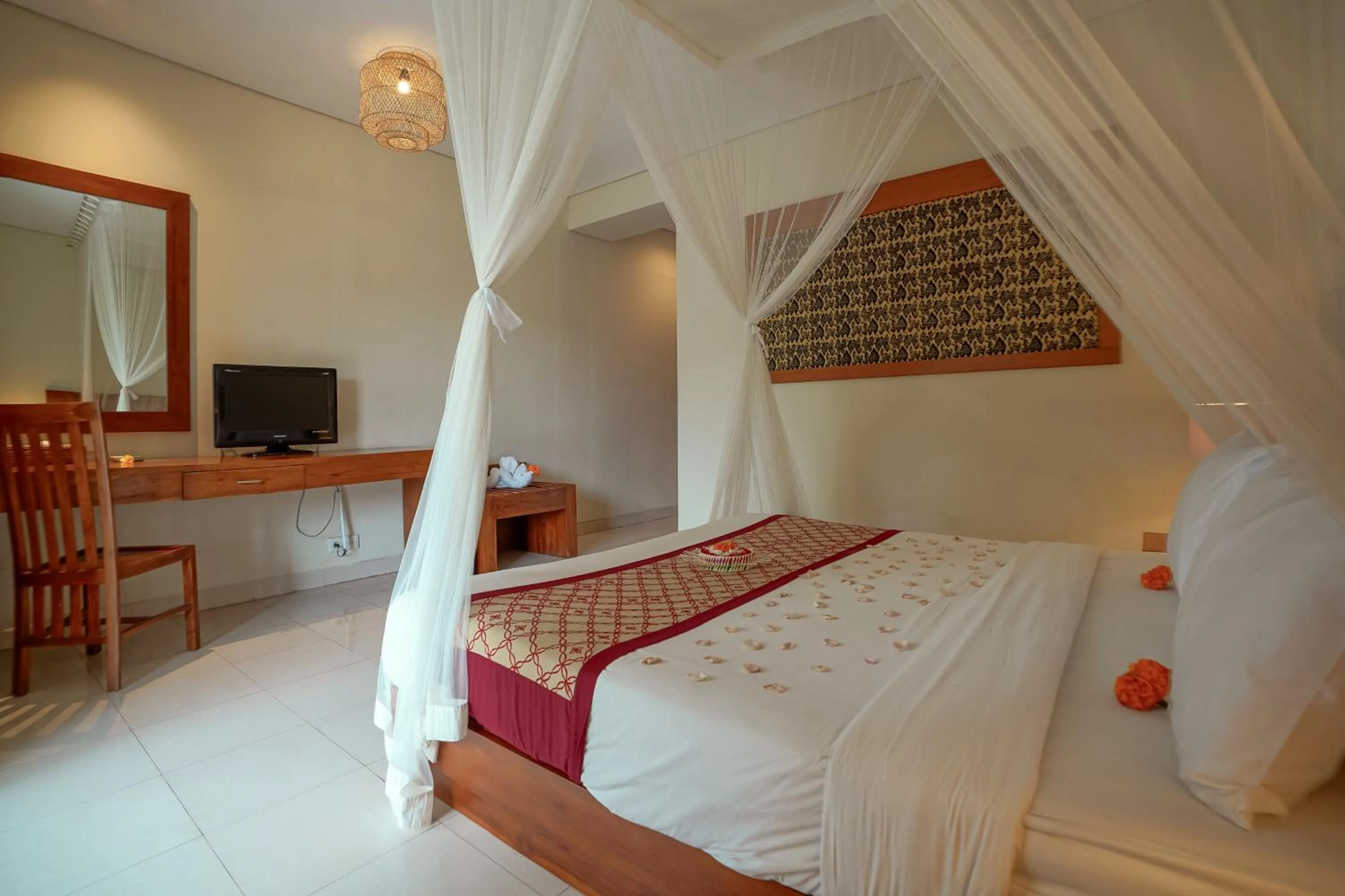 Bed in Pertiwi Resort & Spa