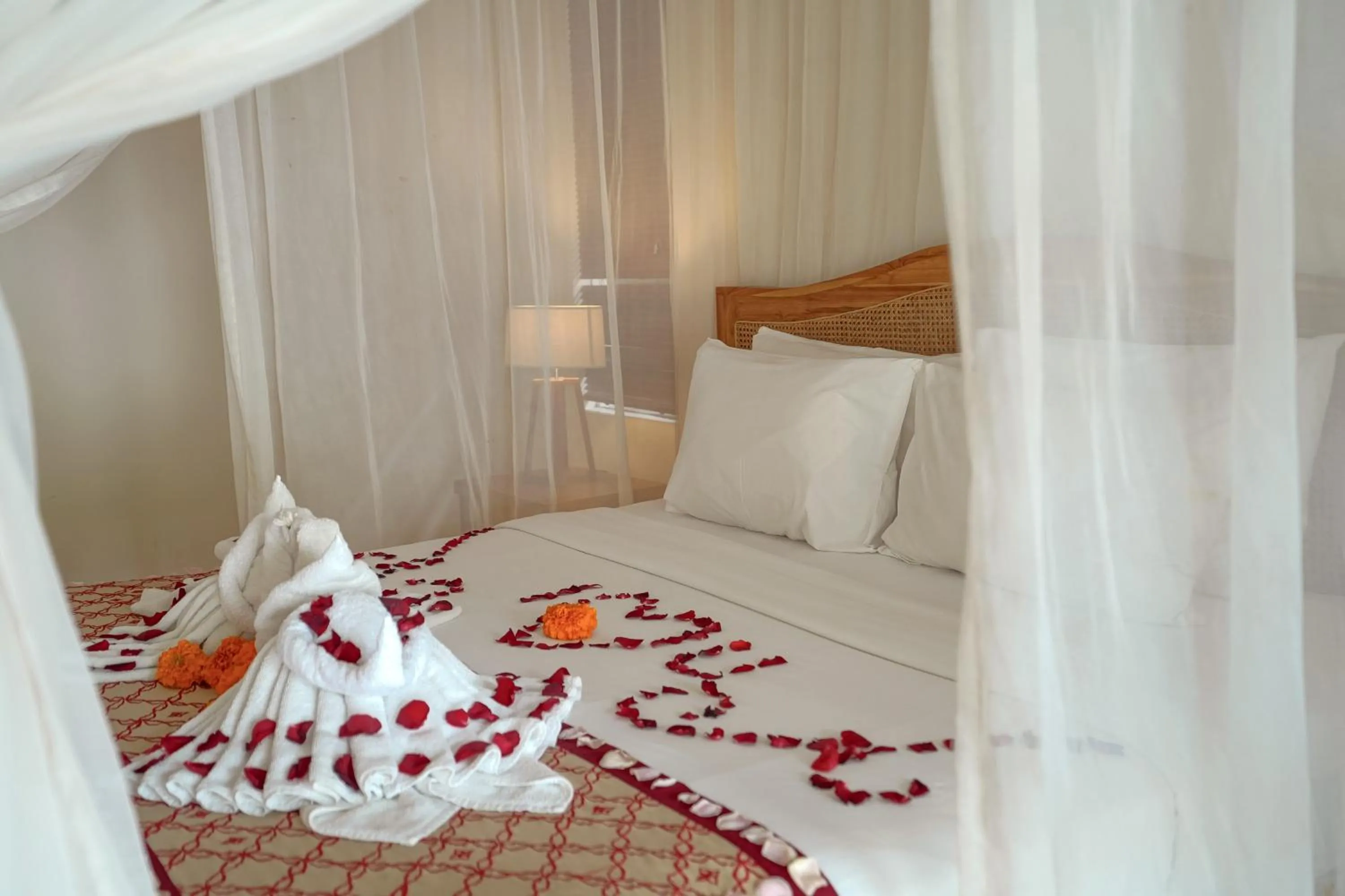 Bed in Pertiwi Resort & Spa