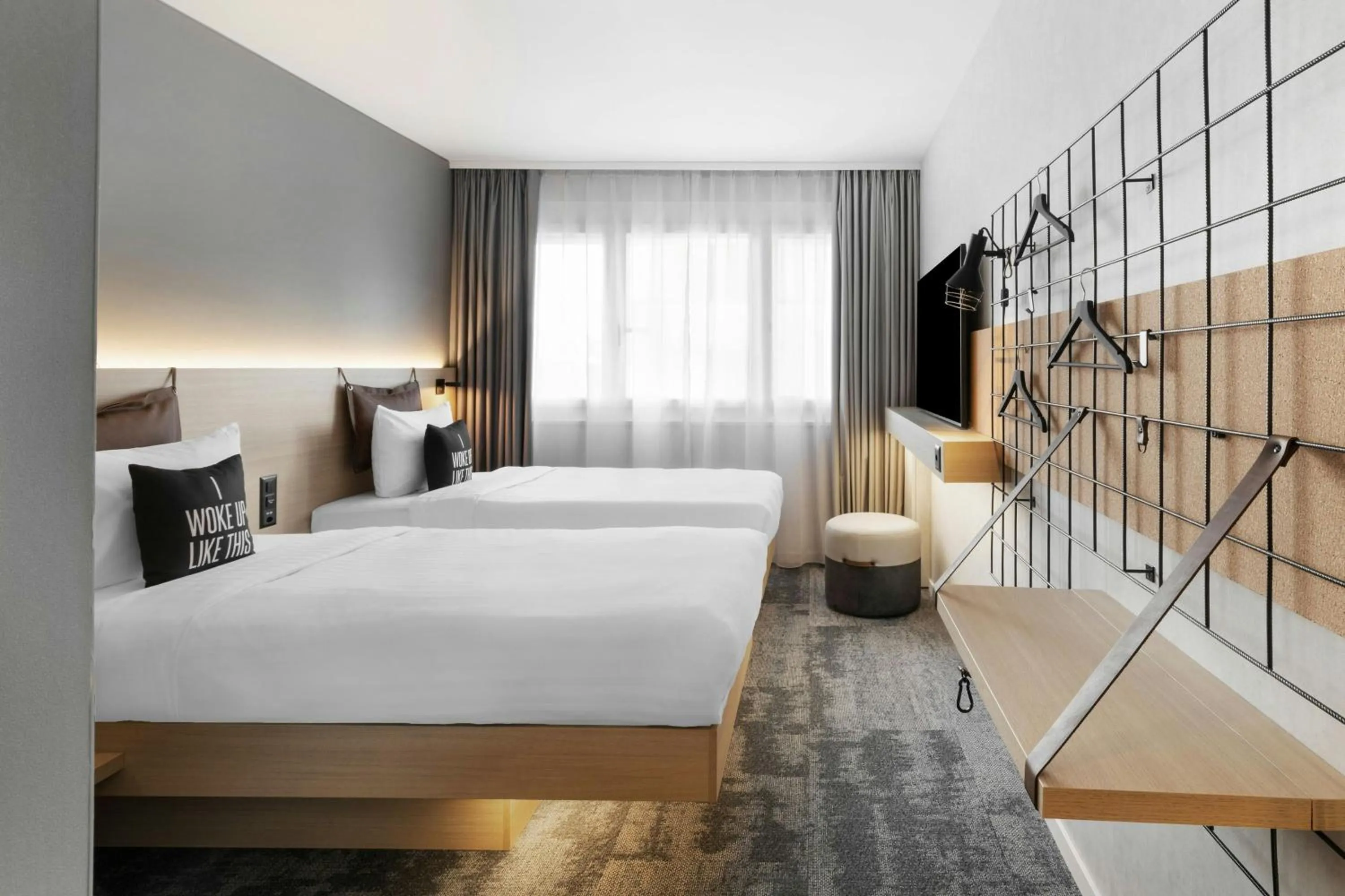 Photo of the whole room, Bed in Moxy Zurich